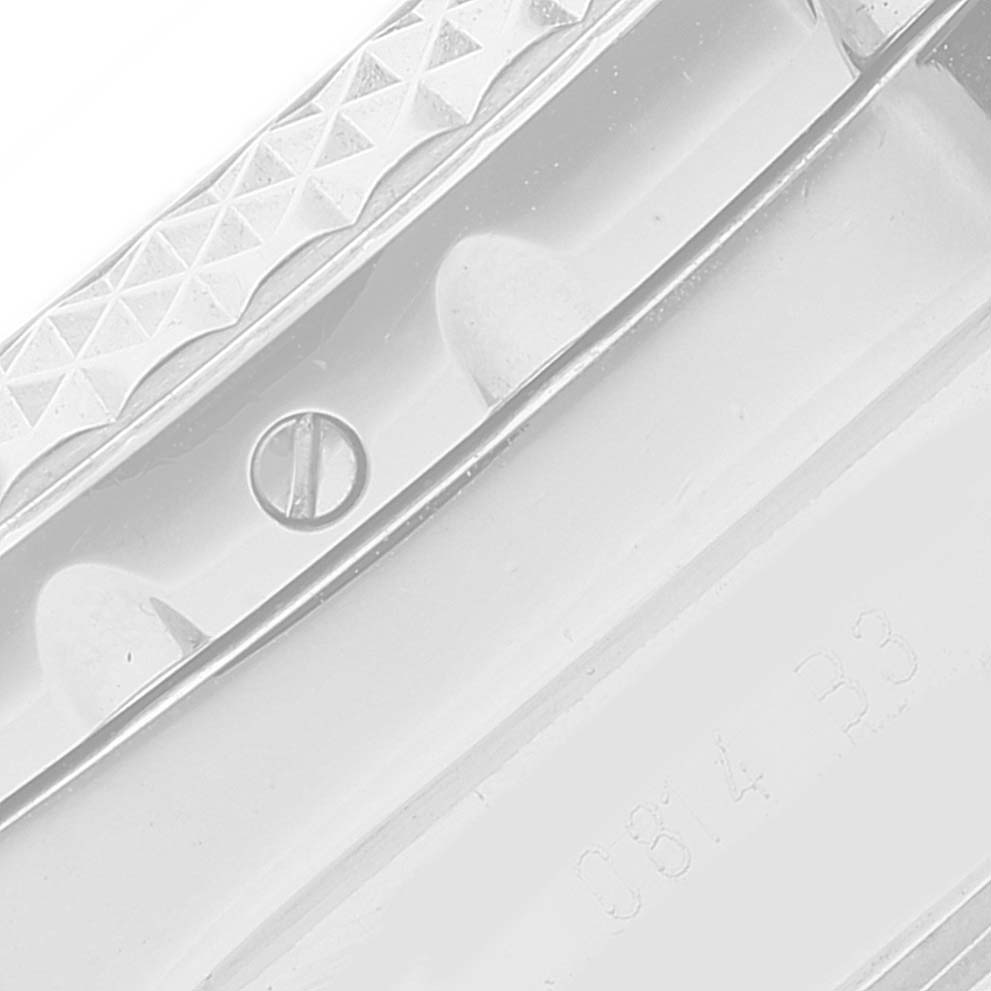 This close-up image shows the detailed side view of the Breitling Bentley AB061112/G768 Men's Stainless Steel Silver Dial AB061112/G768 Men's Stainless Steel Silver Dial watch bezel and a part of the case.