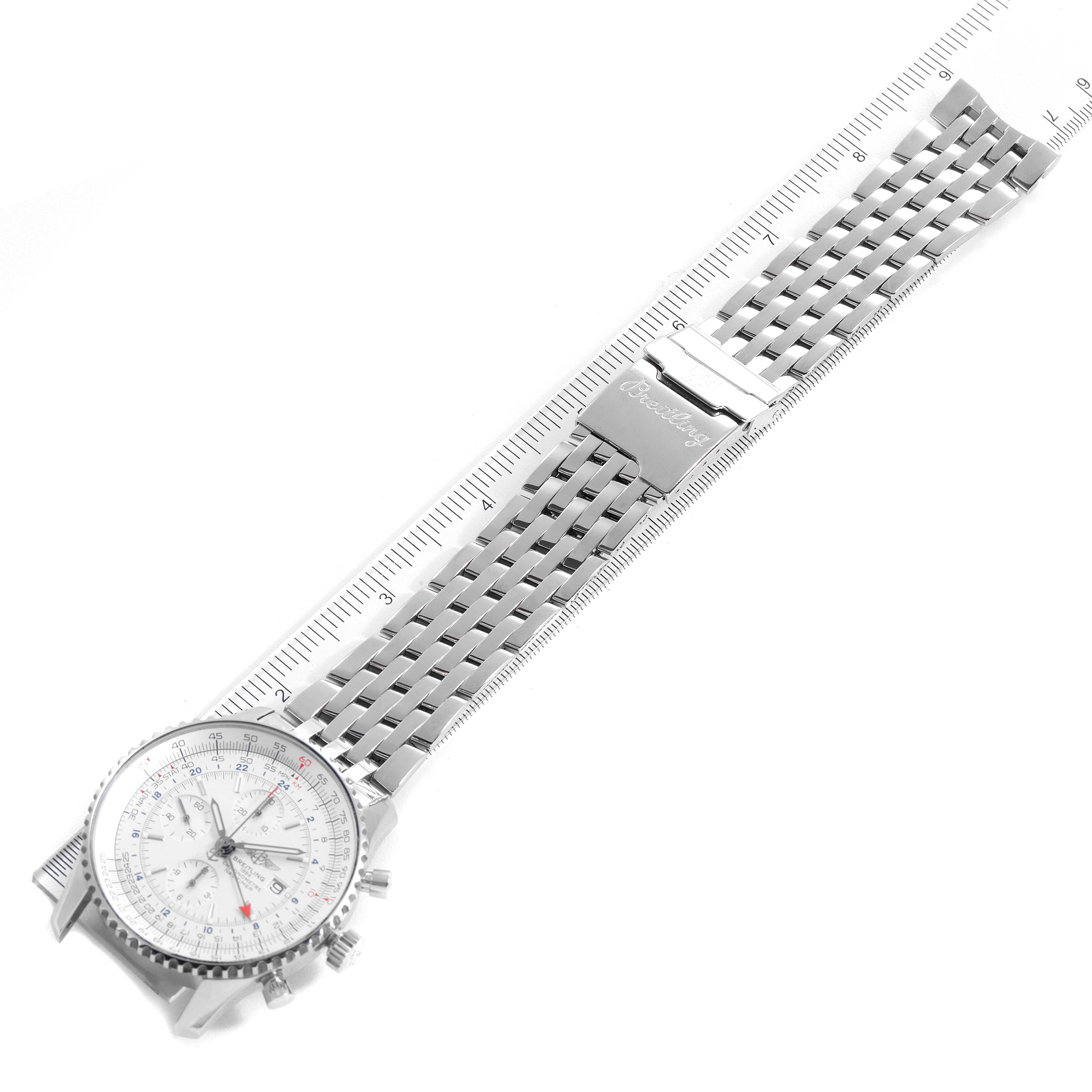 The image shows a Breitling Navitimer A24322 Men's Stainless Steel Silver Dial A24322 Men's Stainless Steel Silver Dial watch from a top-down angle, highlighting its face, metal band, and clasp.