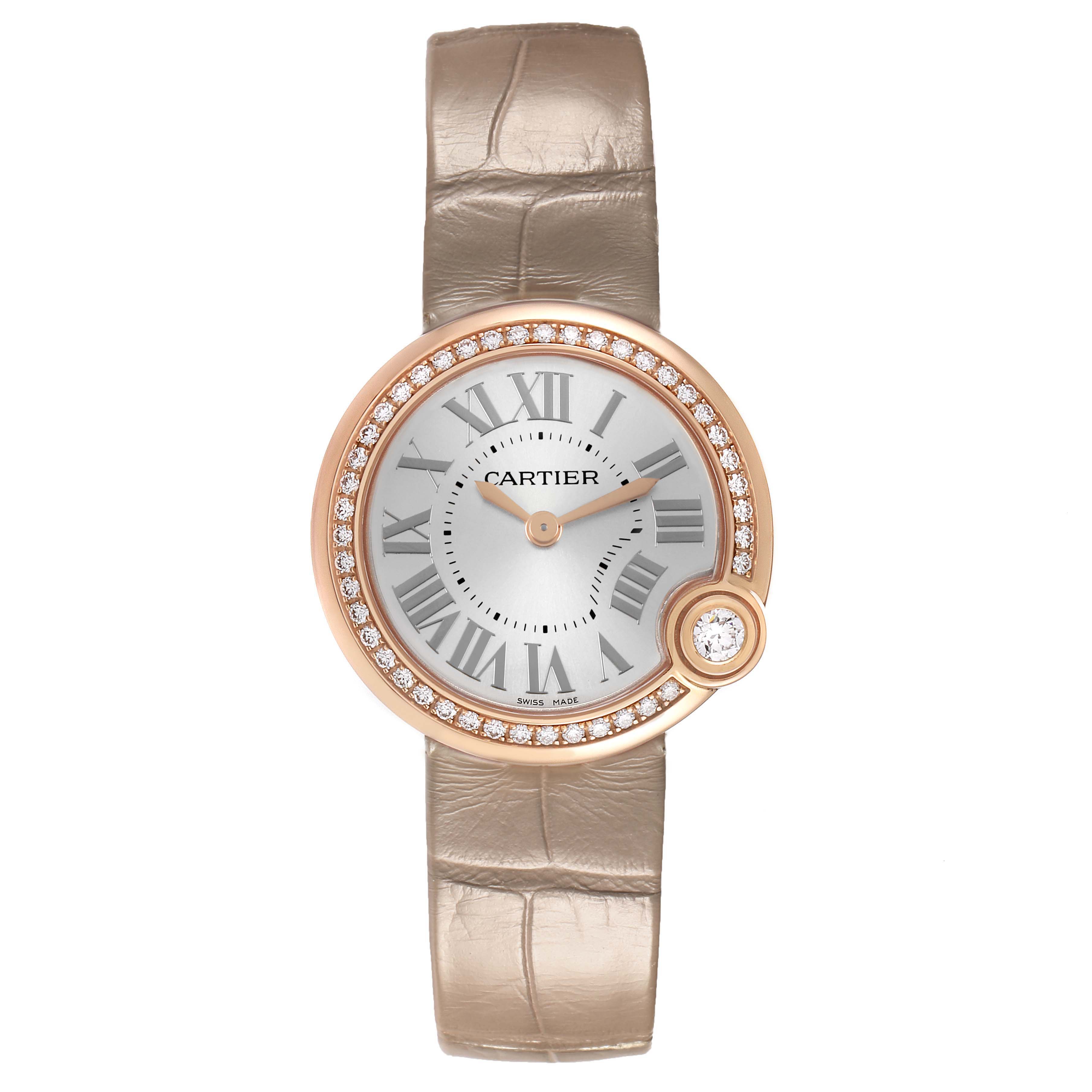 The Cartier Ballon Blanc WJBL0012 Women's Rose Gold Silver Dial watch is shown from a top view, highlighting its round face, diamond bezel, and leather strap.