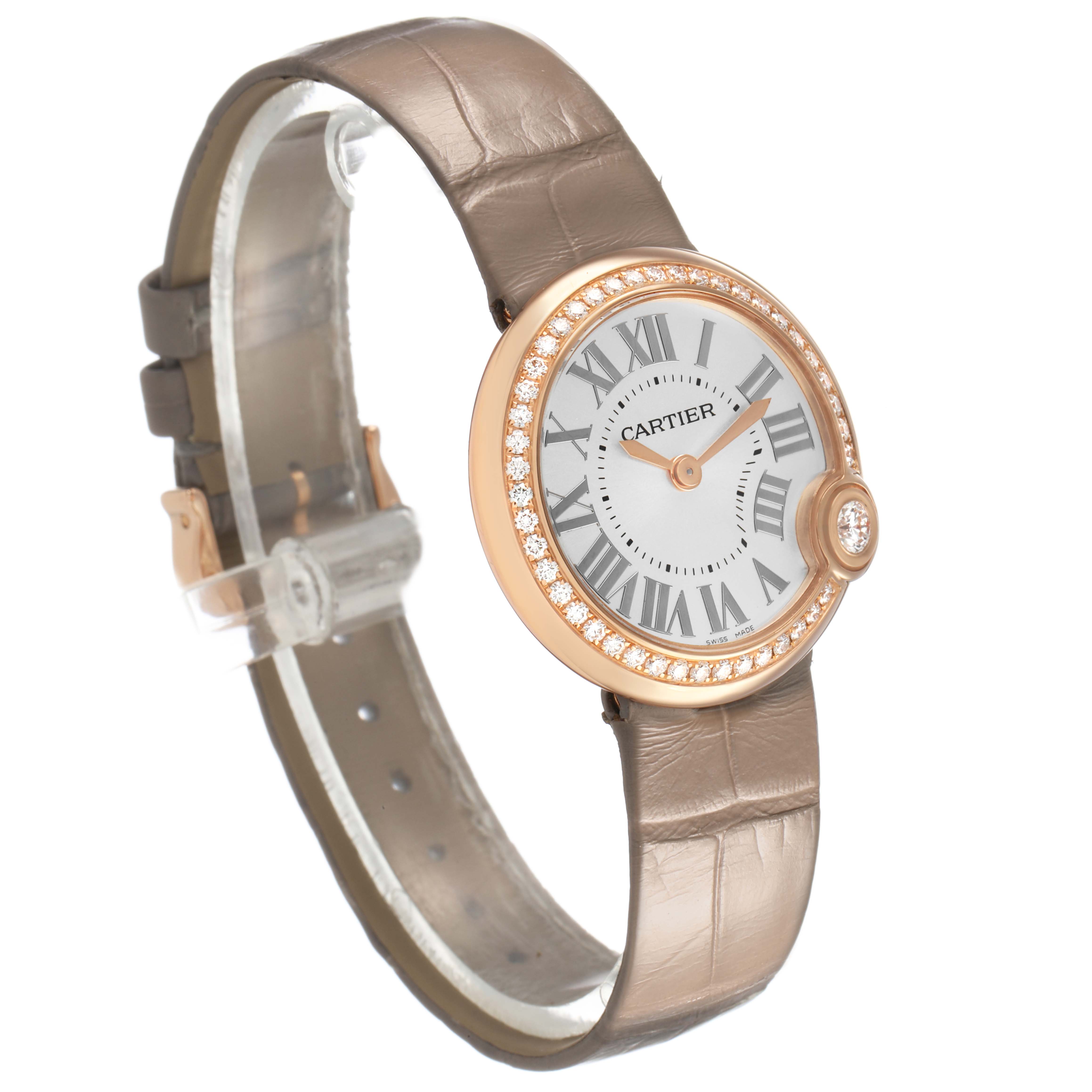 The Cartier Ballon Blanc WJBL0012 Women's Rose Gold Silver Dial watch is shown at a three-quarter angle, highlighting its diamond-set bezel and round case.