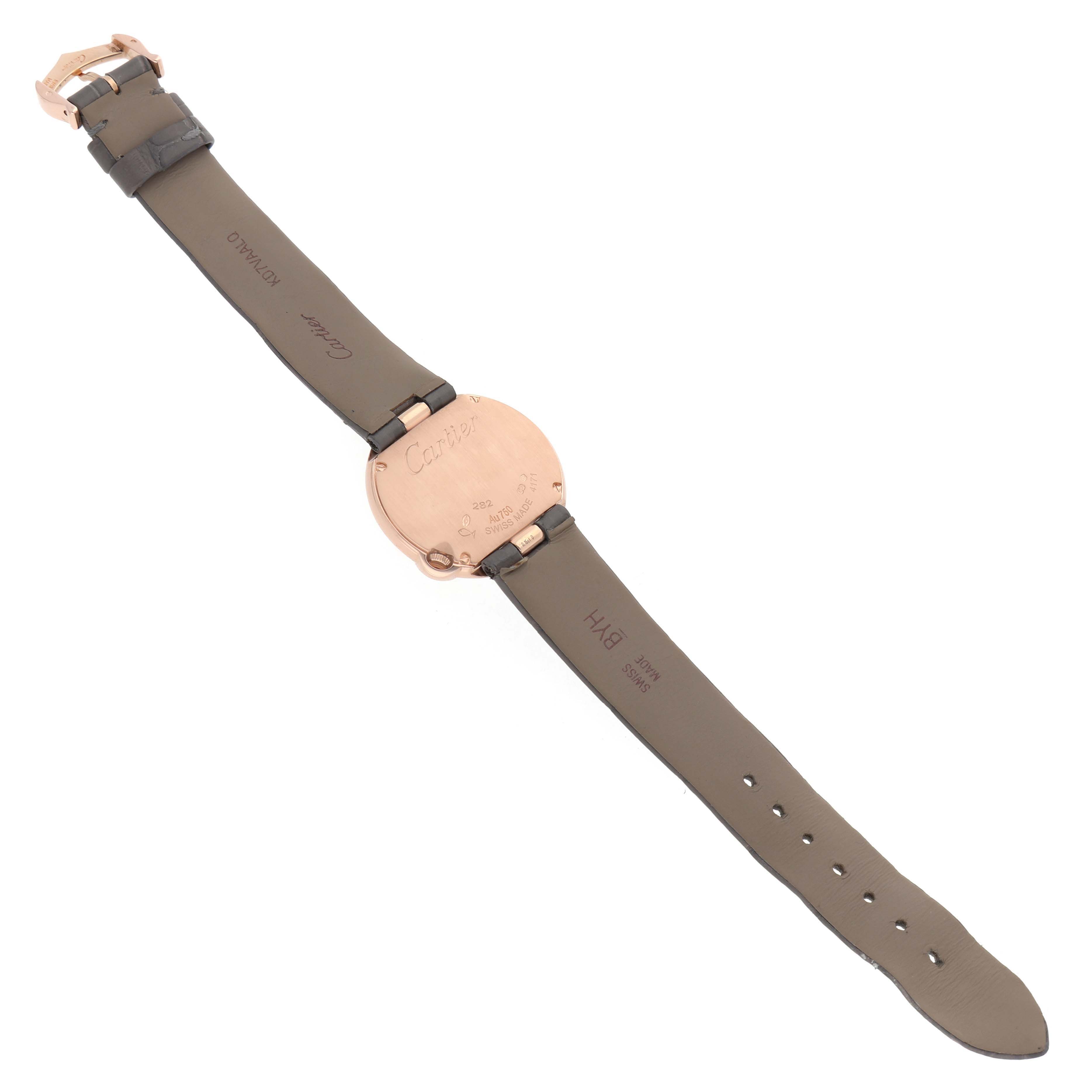 The Cartier Ballon Blanc WJBL0012 Women's Rose Gold Silver Dial watch is shown from the back, displaying the case and leather strap.