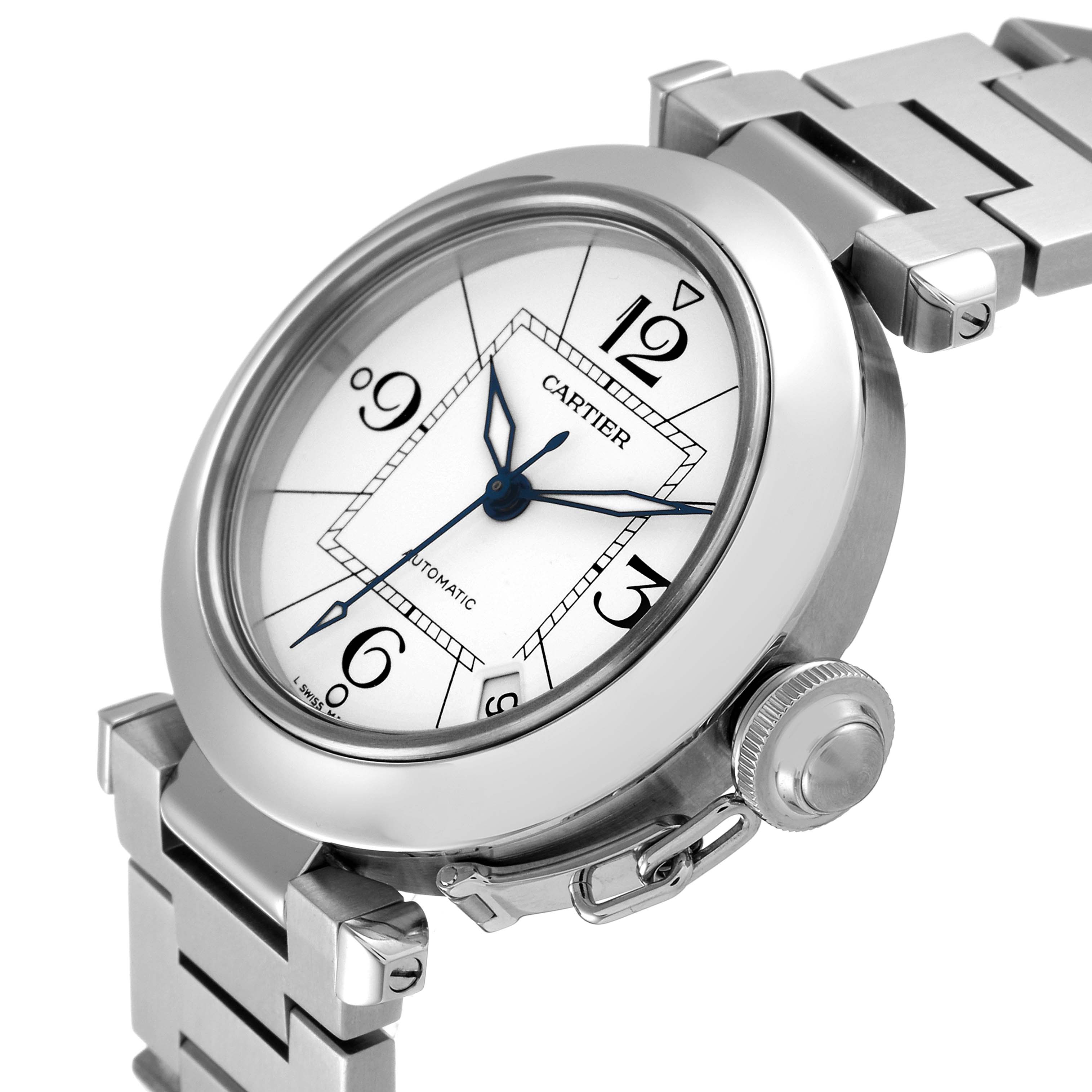 The Cartier Pasha W31074M7 Men's Stainless Steel White Dial W31074M7 Men's Stainless Steel White Dial watch is shown at an angled close-up view highlighting the face, crown, bezel, and part of the bracelet.