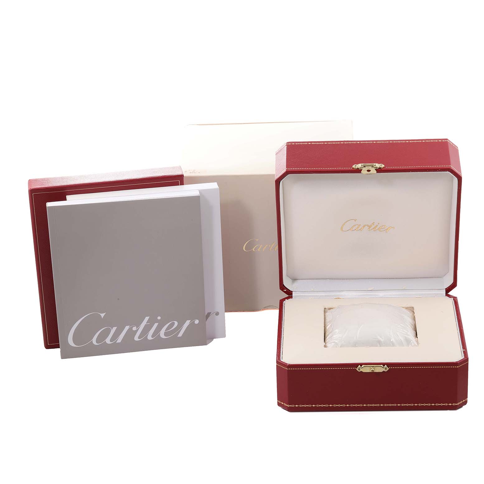 The image shows the Cartier Pasha W31077M7 Men's Stainless Steel Black Dial W31077M7 Men's Stainless Steel Black Dial watch packaging, including the red watch box, beige outer box, and instruction booklets.