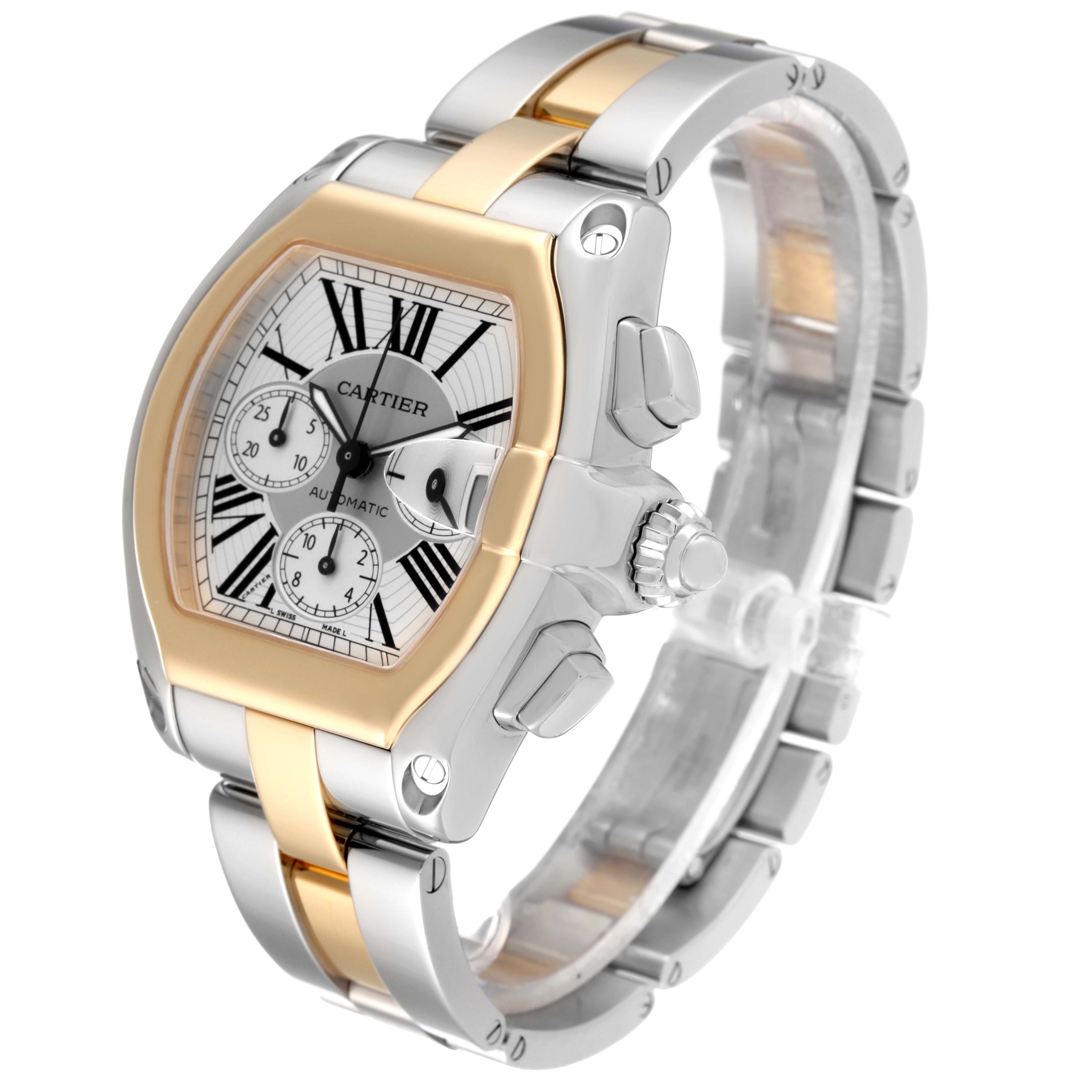 The Cartier Roadster W62027Z1 Men's Steel and Gold (two tone) Silver Dial W62027Z1 Men's Steel and Gold (two tone) Silver Dial watch is shown at an angle, highlighting its face, bezel, crown, and two-tone bracelet.