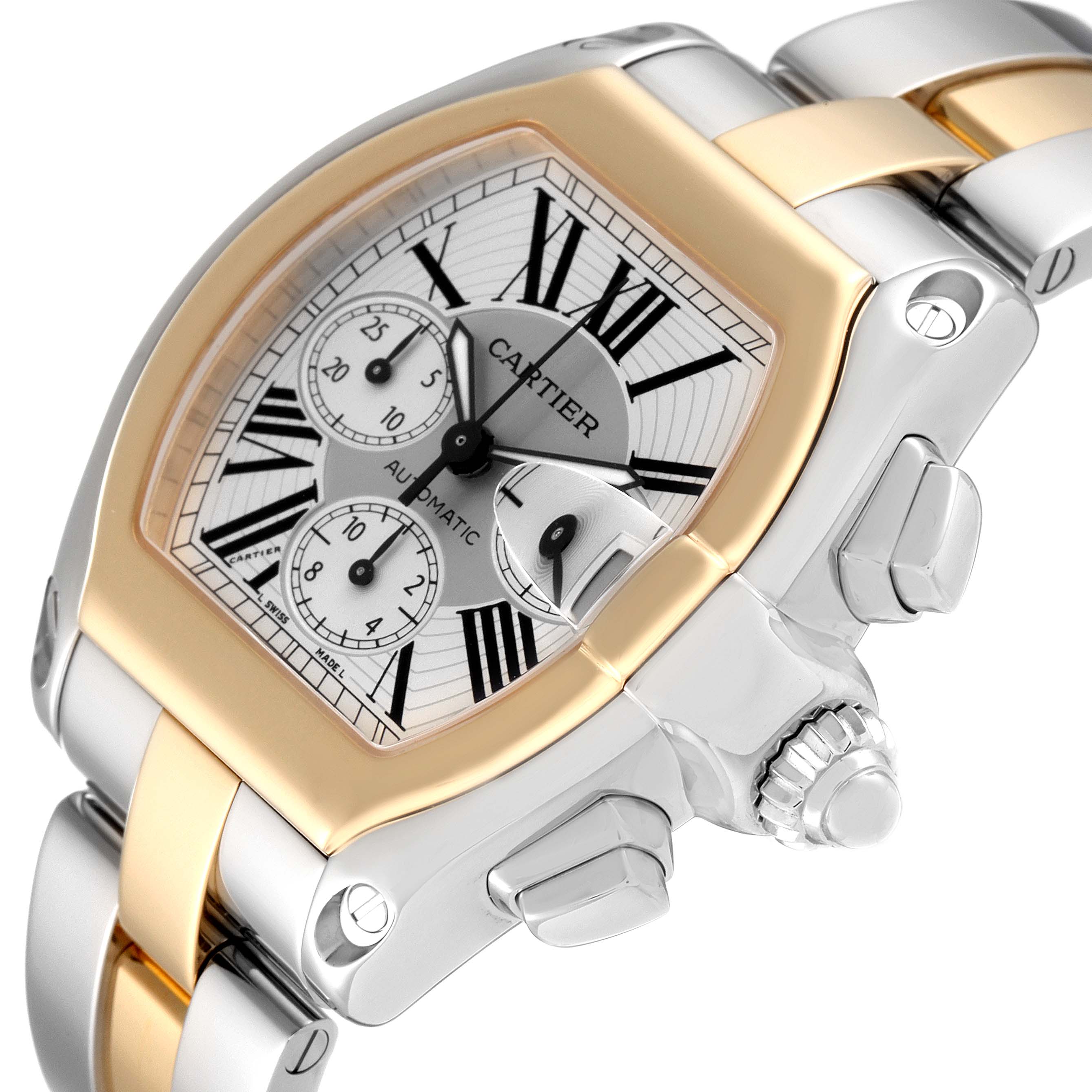 The image shows a close-up angle of a Cartier Roadster W62027Z1 Men's Steel and Gold (two tone) Silver Dial W62027Z1 Men's Steel and Gold (two tone) Silver Dial watch highlighting its face, bezel, and part of the bracelet with the crown.