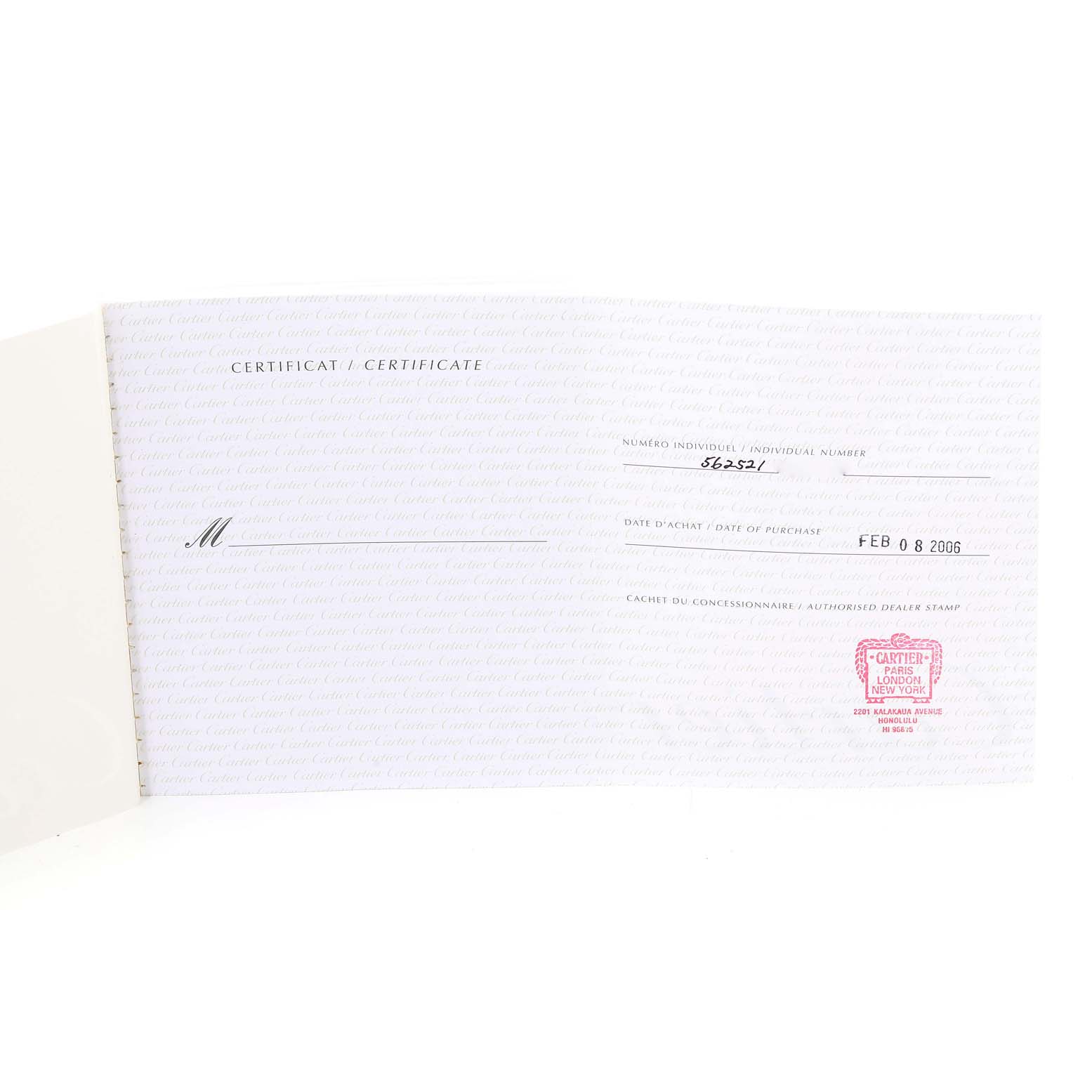 This image shows an open certificate for the Cartier Roadster W62027Z1 Men's Steel and Gold (two tone) Silver Dial W62027Z1 Men's Steel and Gold (two tone) Silver Dial model watch, displaying the purchase date and dealer stamp.