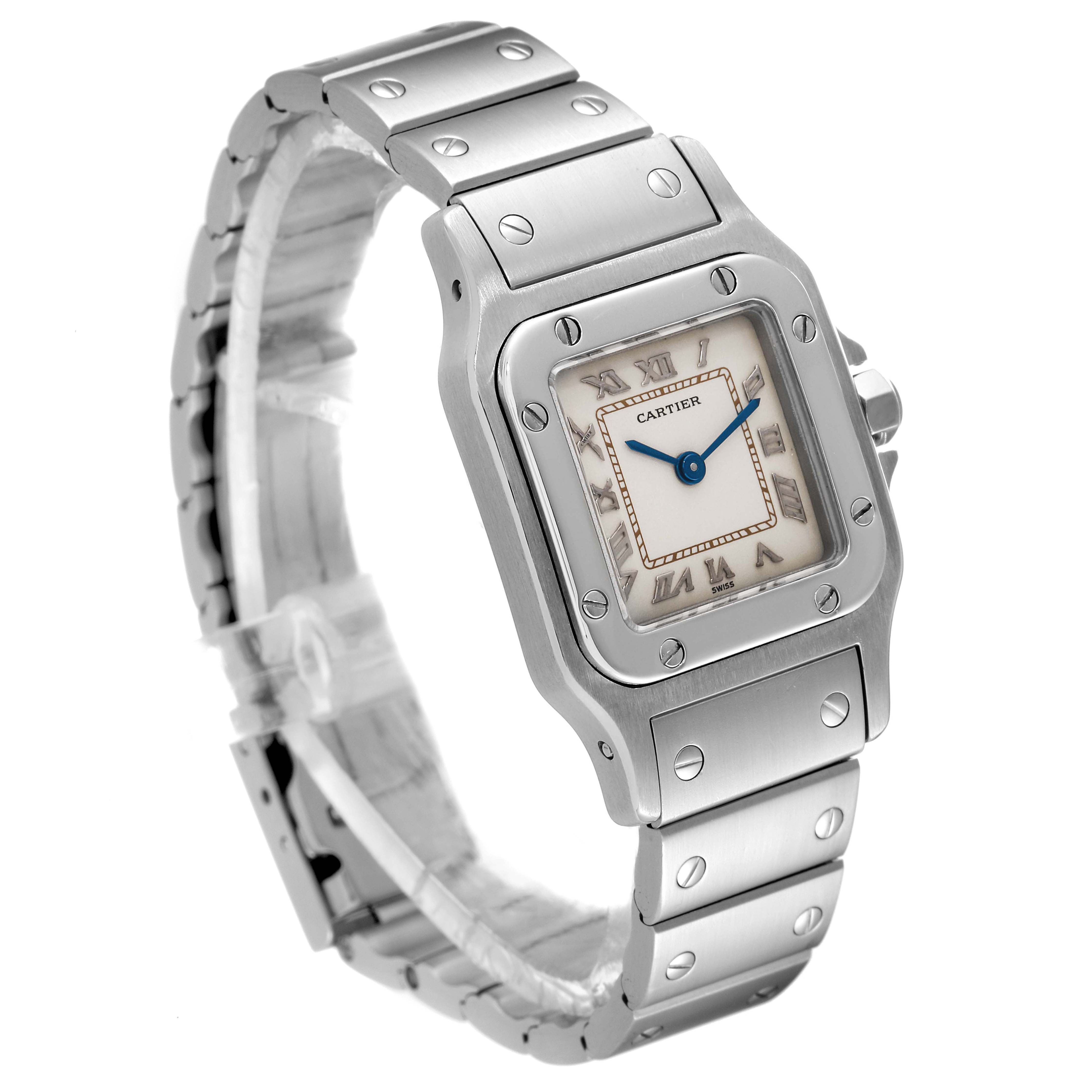 The image shows a Cartier Santos 1565 Women's Stainless Steel Silver Dial 1565 Women's Stainless Steel Silver Dial watch at a slight left-side angle, featuring the face, bezel, and strap.