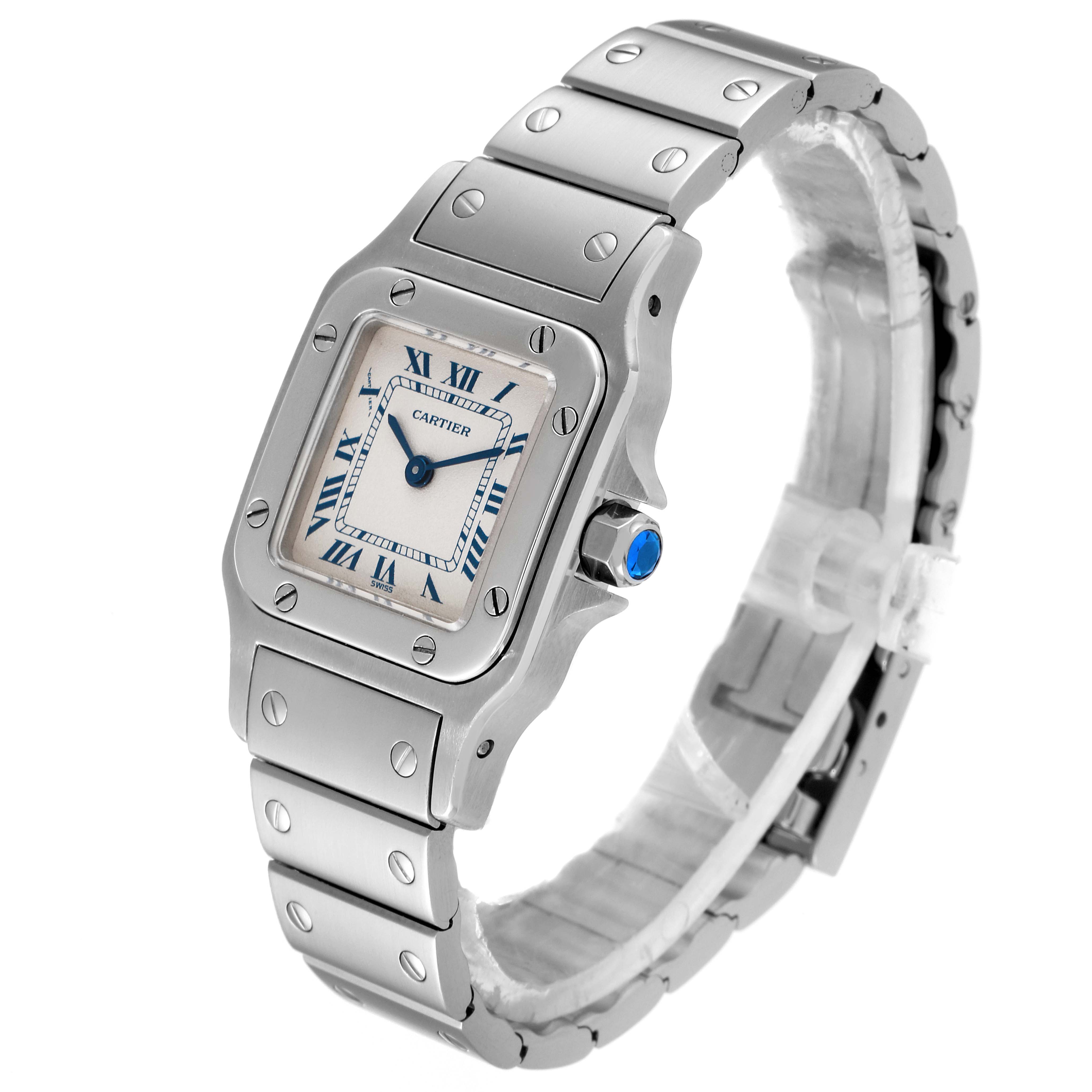 This image shows a Cartier Santos W20056D6 Women's Stainless Steel Silver Dial W20056D6 Women's Stainless Steel Silver Dial watch at a three-quarter angle, highlighting its face, case, and stainless steel bracelet.