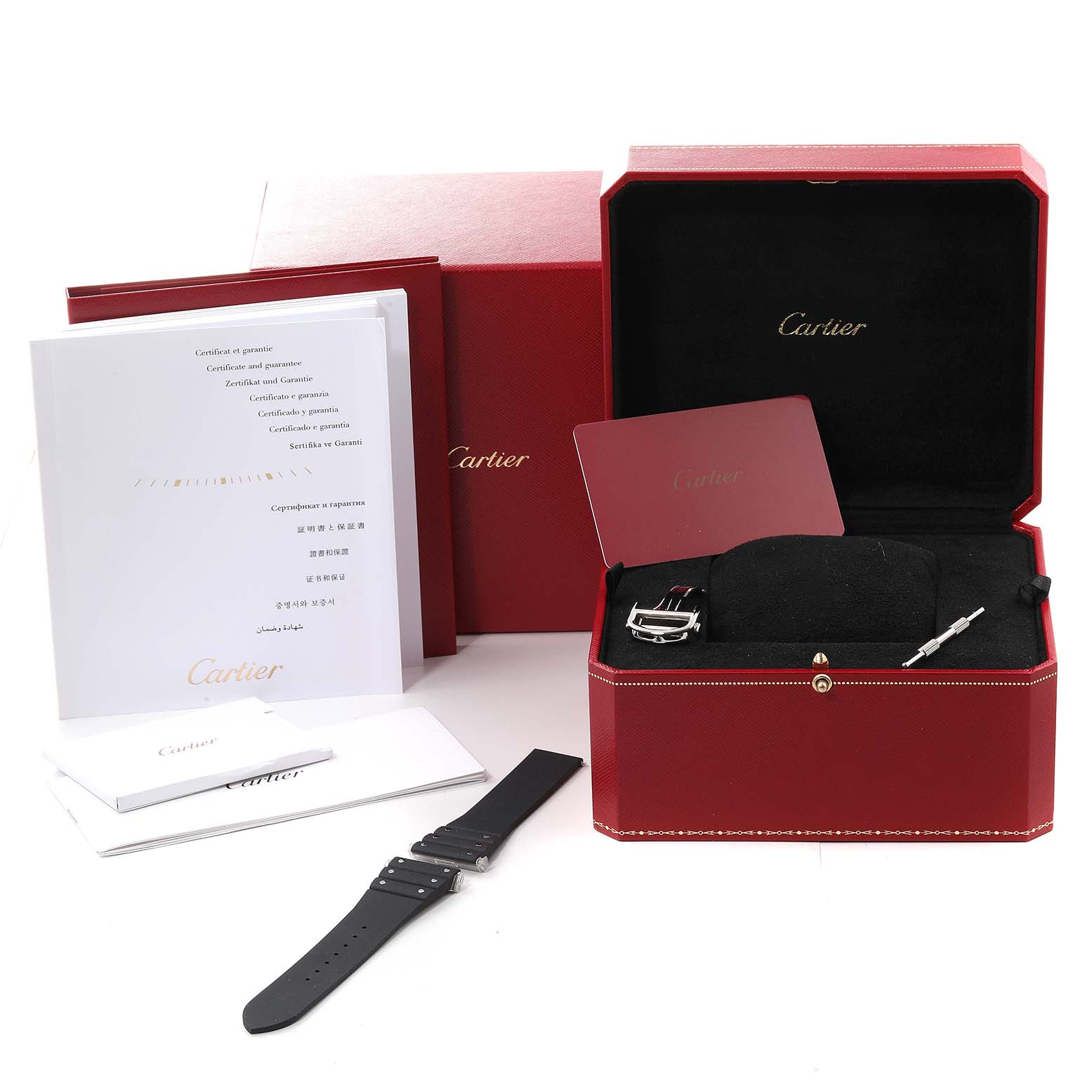 The image displays a Cartier Santos W2SA0008 Men's Steel and Gold (two tone) Silver Dial W2SA0008 Men's Steel and Gold (two tone) Silver Dial watch set showing its box, certificates, strap, and tool from an eye-level angle.