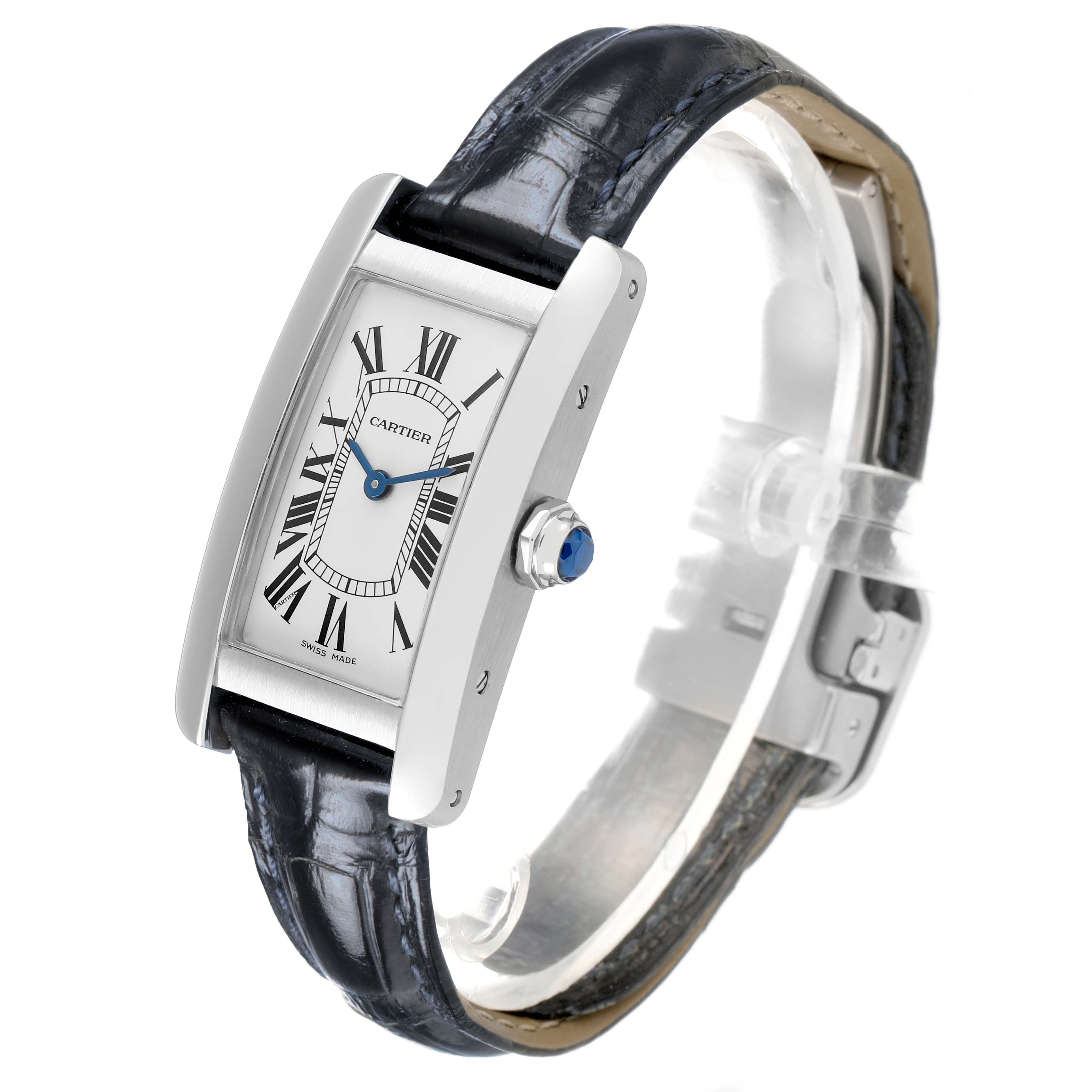 The Cartier Tank Americaine WSTA0016 Women's Stainless Steel Silver Dial watch is shown at an angle displaying the face, crown, strap, and buckle.