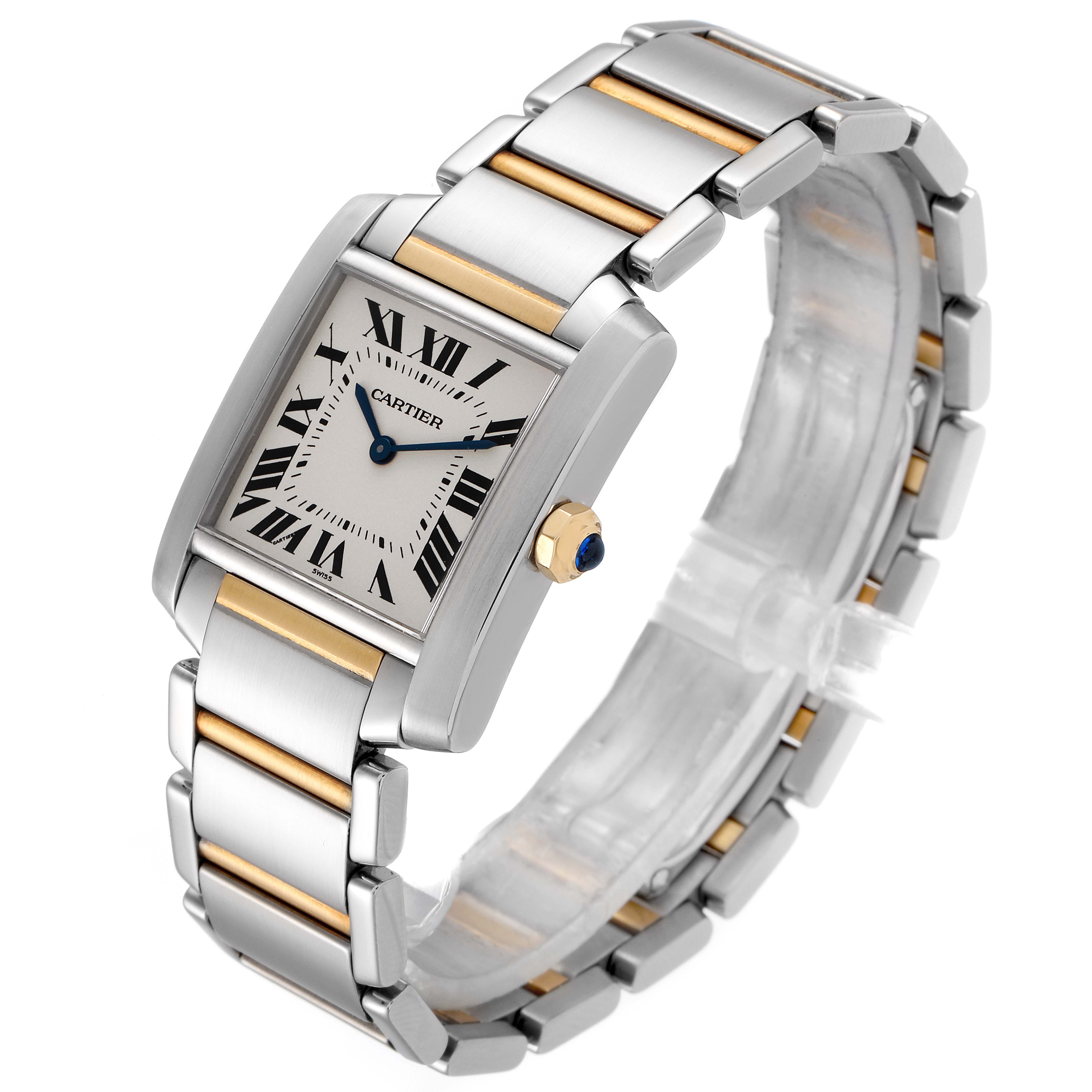 The image shows a Cartier Tank Française watch at an angled view, highlighting its rectangular face and two-tone metal bracelet.