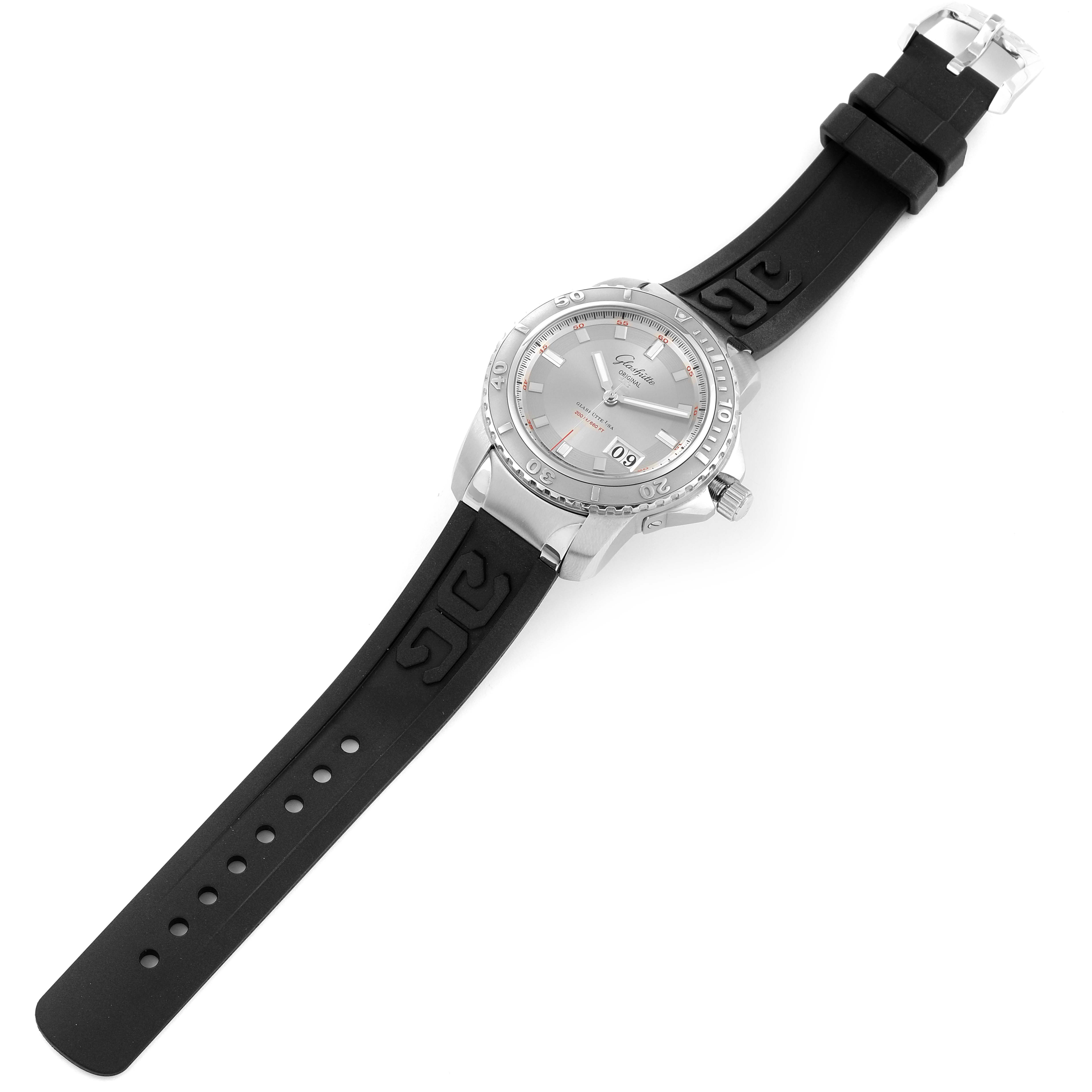 The image shows Glashutte Original 39-42-44-04-14 Men's Stainless Steel Silver Dial 39-42-44-04-14 Men's Stainless Steel Silver Dial model watch at an overhead angle, displaying its dial, bezel, and rubber strap.