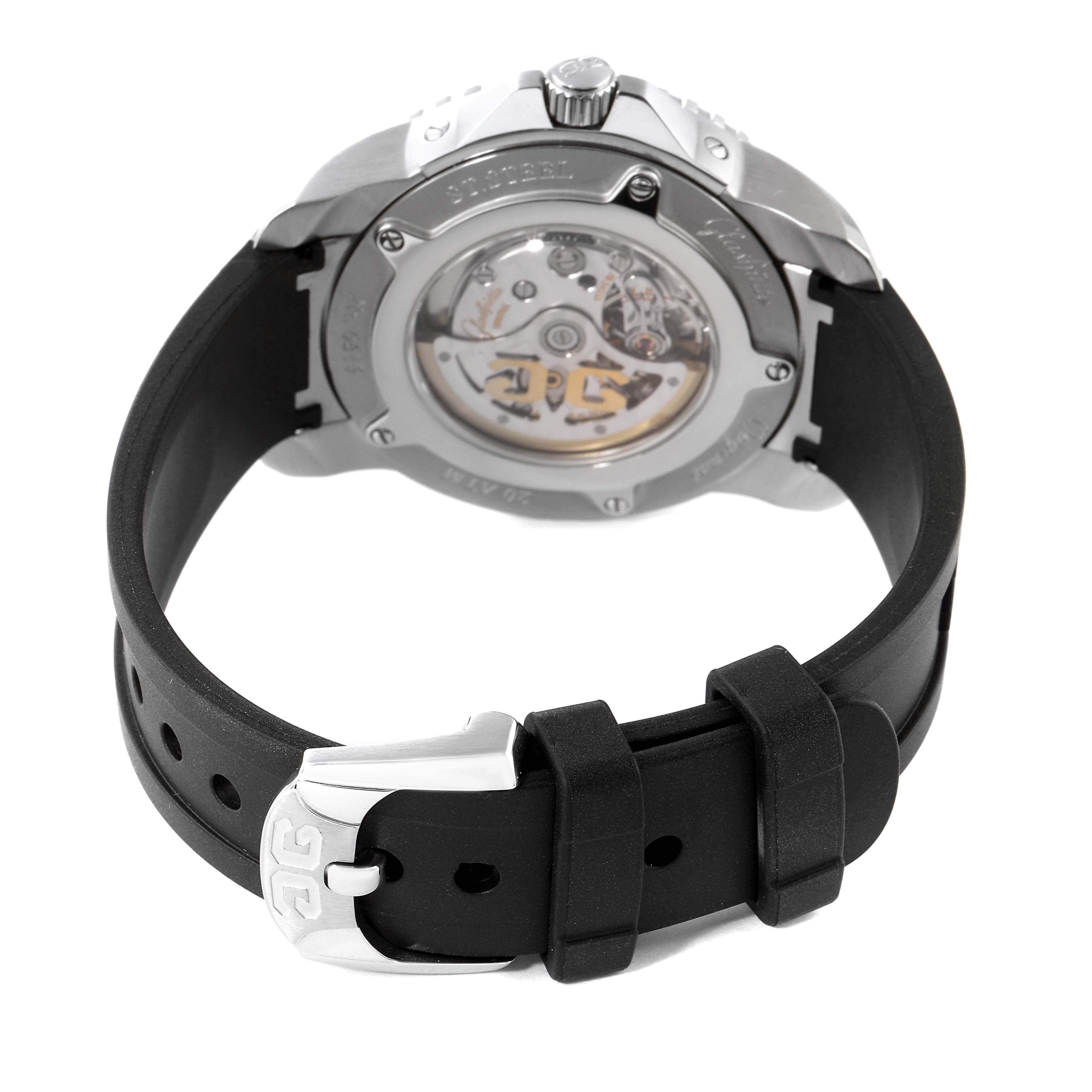 The image shows the back of a Glashütte Original watch, highlighting the transparent case back and black rubber strap with a buckle.