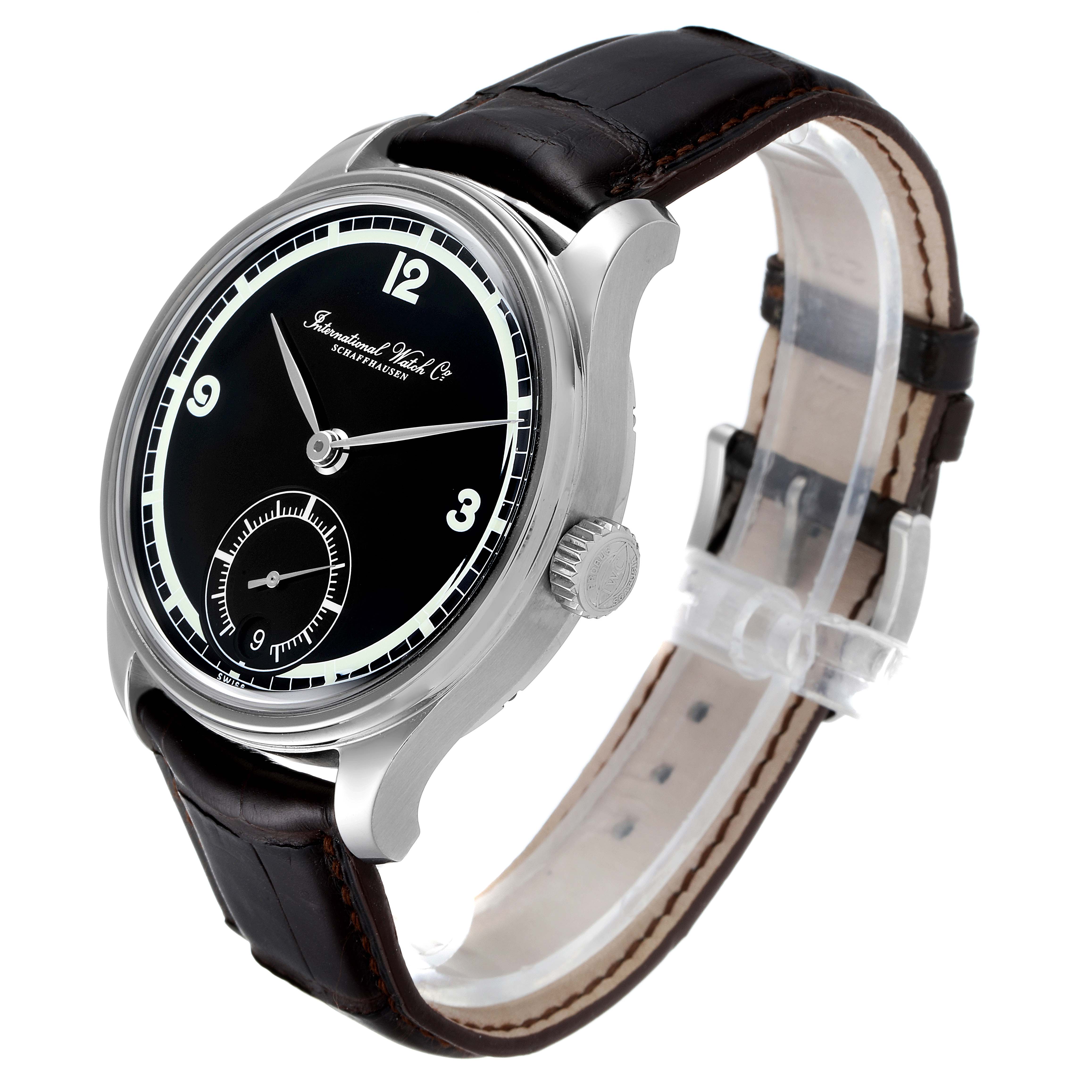 The IWC Portuguese IW510205 Men's Stainless Steel Black Dial IW510205 Men's Stainless Steel Black Dial model watch is shown at an oblique angle, highlighting its black dial, silver case, crown, and leather strap.