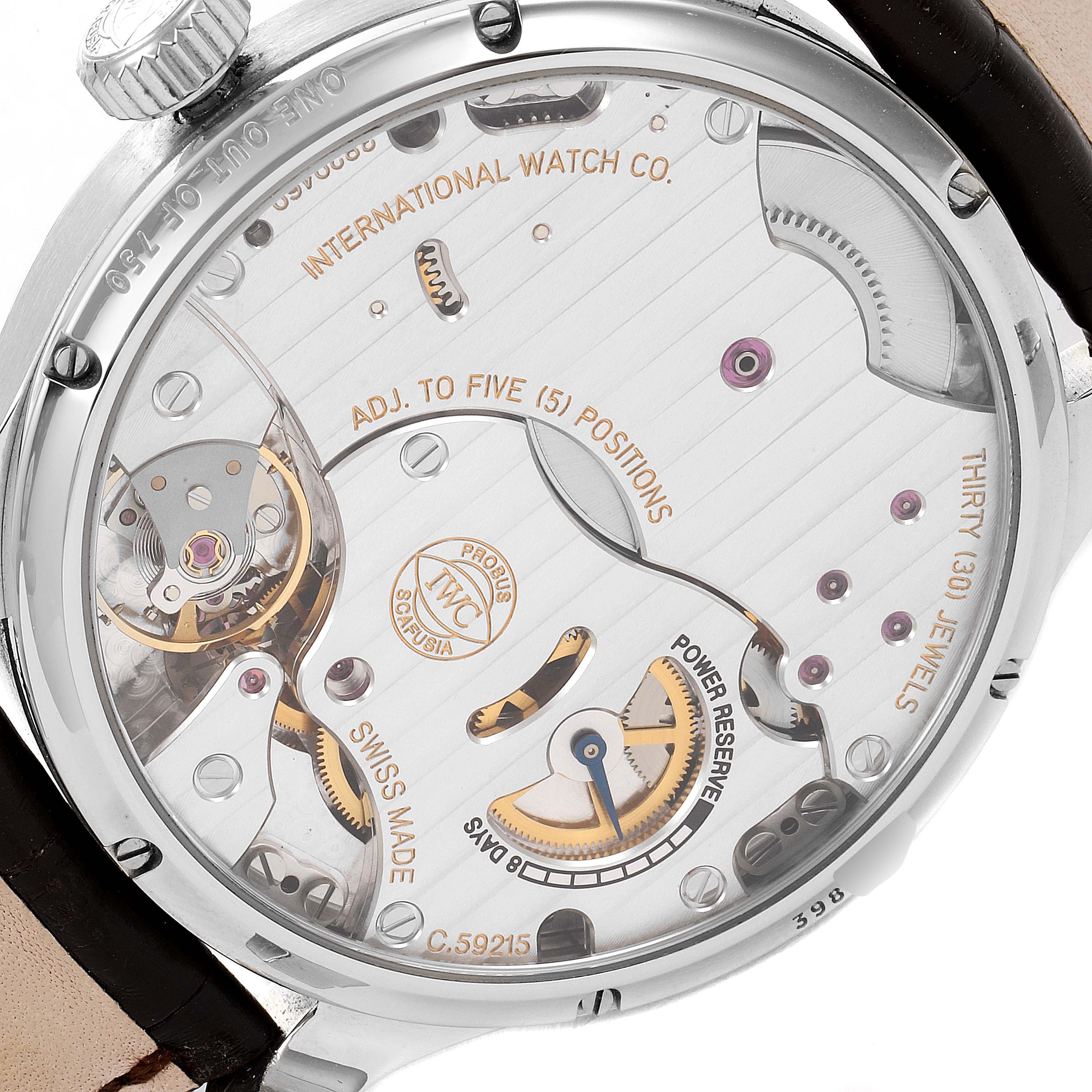 The image shows the back view of an IWC Portuguese IW510205 Men's Stainless Steel Black Dial IW510205 Men's Stainless Steel Black Dial model watch, revealing its intricate movement and components.