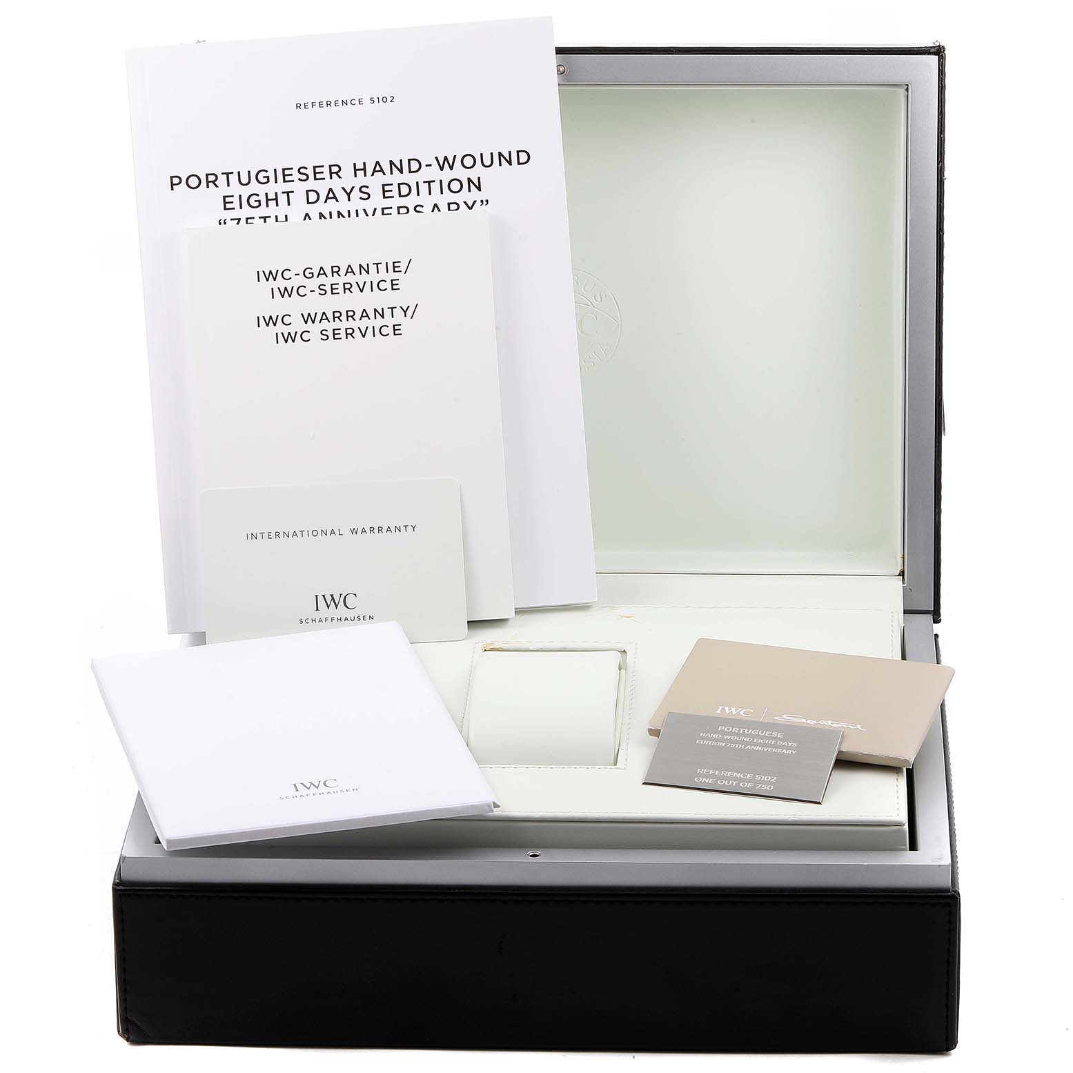 The image shows the packaging and accessories for an IWC Portuguese IW510205 Men's Stainless Steel Black Dial IW510205 Men's Stainless Steel Black Dial Hand-Wound Eight Days Edition watch.