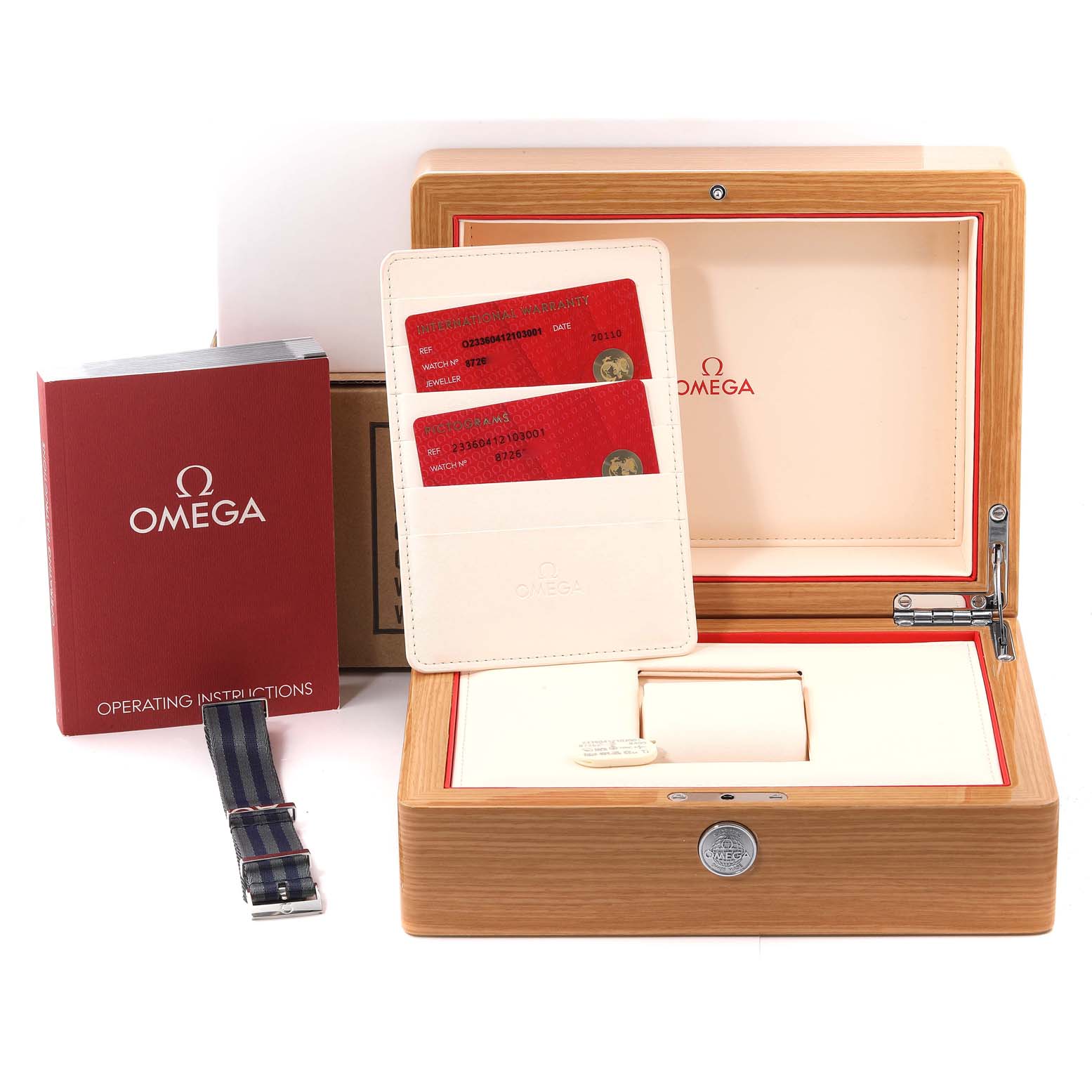 The image shows the accessories, including the box, instruction manual, and cards, for an Omega Seamaster 233.60.41.21.03.001 Men's Steel and Gold (two tone) Blue Dial 233.60.41.21.03.001 Men's Steel and Gold (two tone) Blue Dial watch.