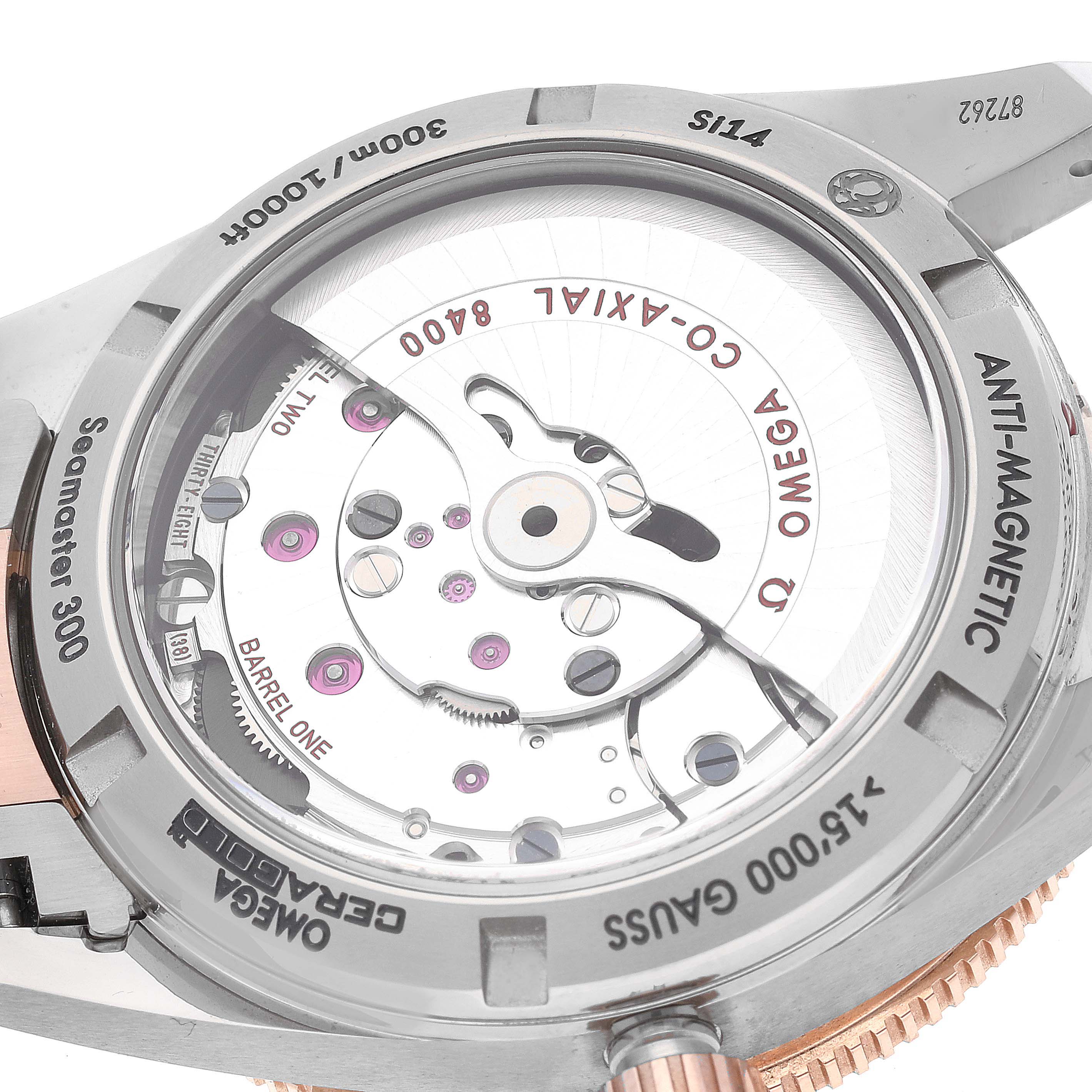 The image shows the backside and internal mechanism of an Omega Seamaster 233.60.41.21.03.001 Men's Steel and Gold (two tone) Blue Dial 233.60.41.21.03.001 Men's Steel and Gold (two tone) Blue Dial 300 watch, highlighting its movement.