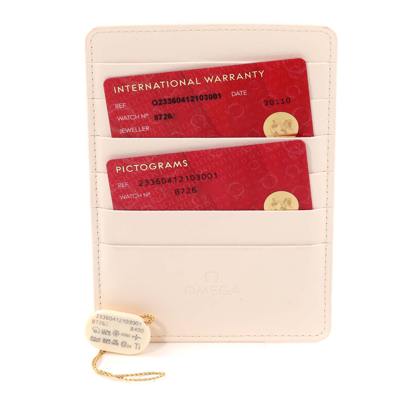 This image shows the warranty and pictogram cards for an Omega Seamaster 233.60.41.21.03.001 Men's Steel and Gold (two tone) Blue Dial 233.60.41.21.03.001 Men's Steel and Gold (two tone) Blue Dial watch, along with a tag, all in a beige cardholder.