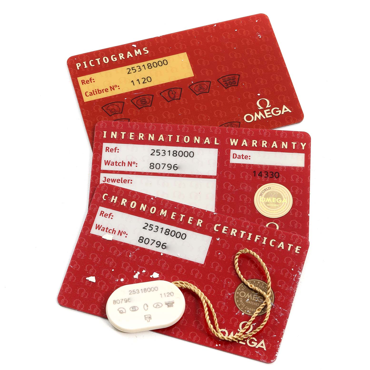 The image shows international warranty, chronometer certificate cards, and a hang tag for the Omega Seamaster 2531.80.00 Men's Stainless Steel Blue Dial 2531.80.00 Men's Stainless Steel Blue Dial watch.