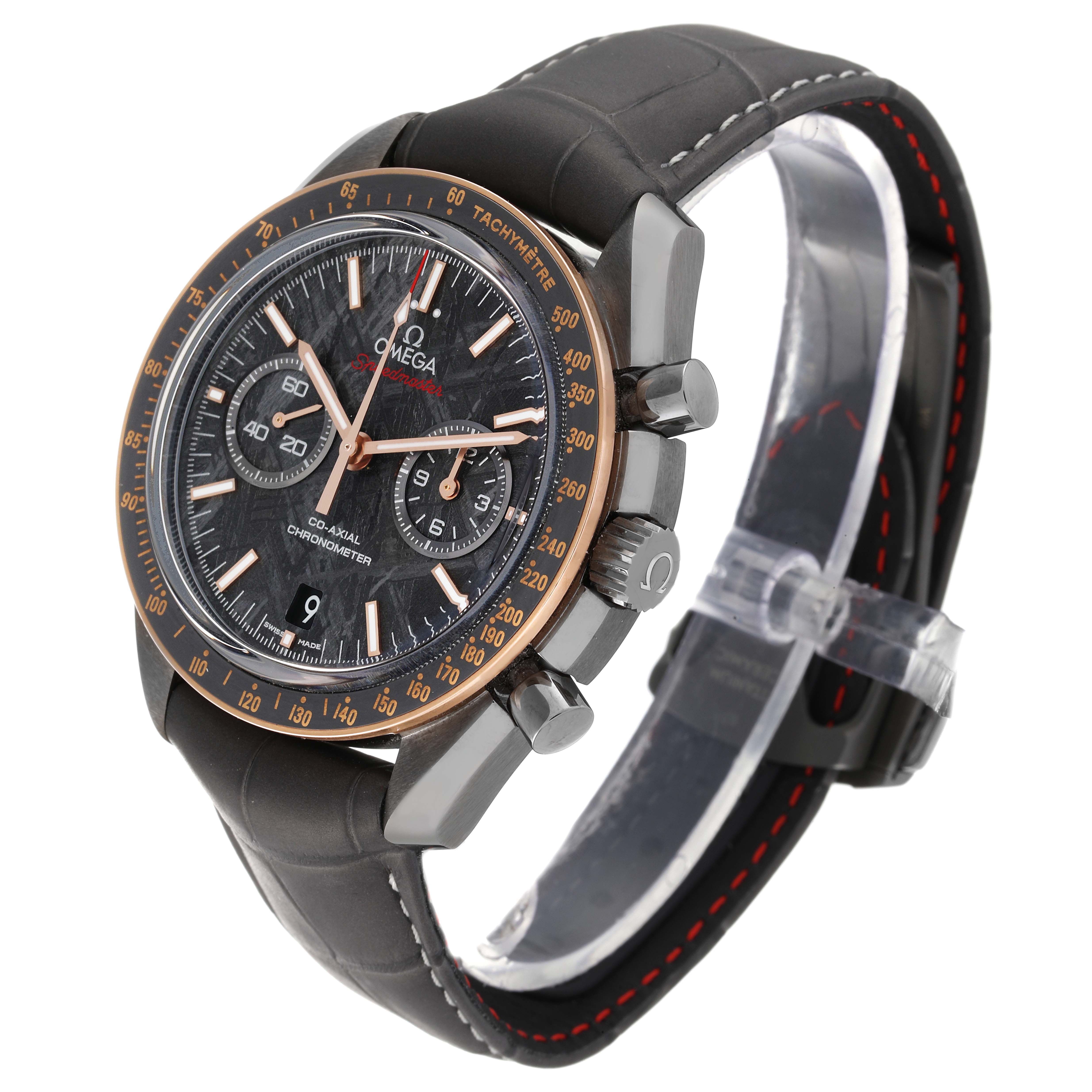 The Omega Speedmaster 311.63.44.51.99.001 Men's Ceramic Grey Dial 311.63.44.51.99.001 Men's Ceramic Grey Dial watch is shown at a three-quarter angle, highlighting its dial, bezel, and leather strap.