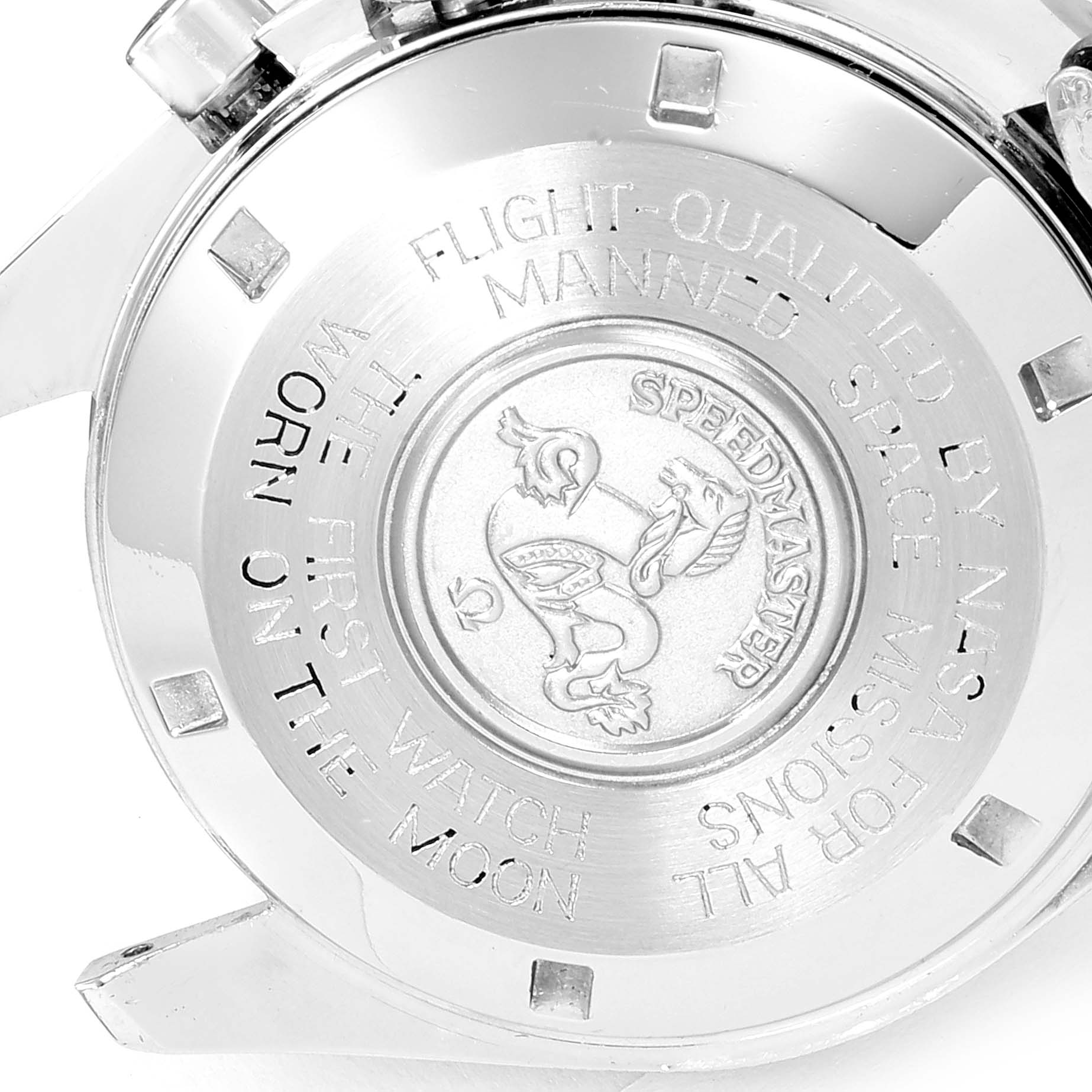 This image shows the back case of a Speedmaster model by Omega, featuring engraved text and logo.