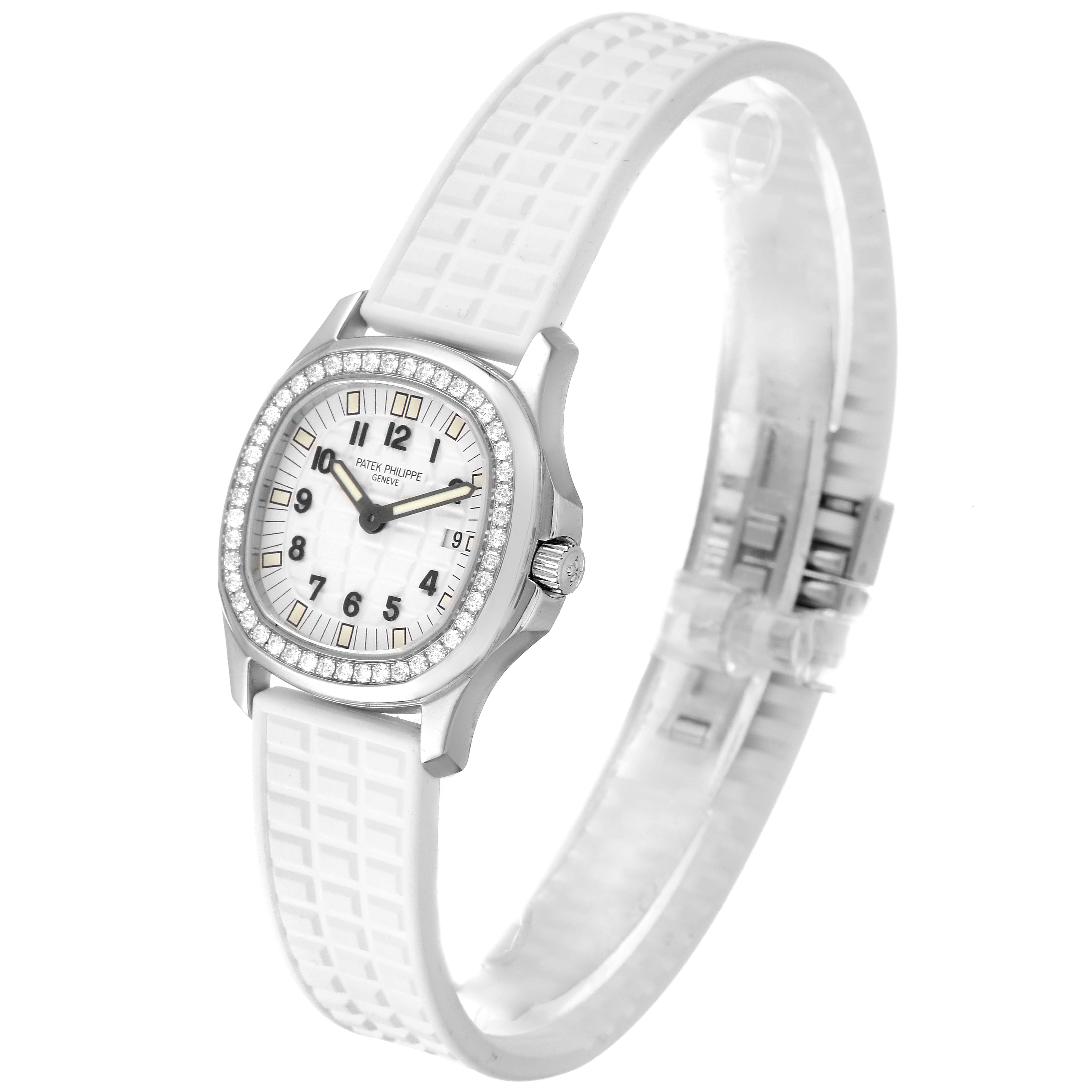 The image shows a Patek Philippe Aquanaut 4961 Women's Stainless Steel White Dial 4961 Women's Stainless Steel White Dial watch at a 3/4 angle, highlighting its white dial, diamond bezel, and white strap.
