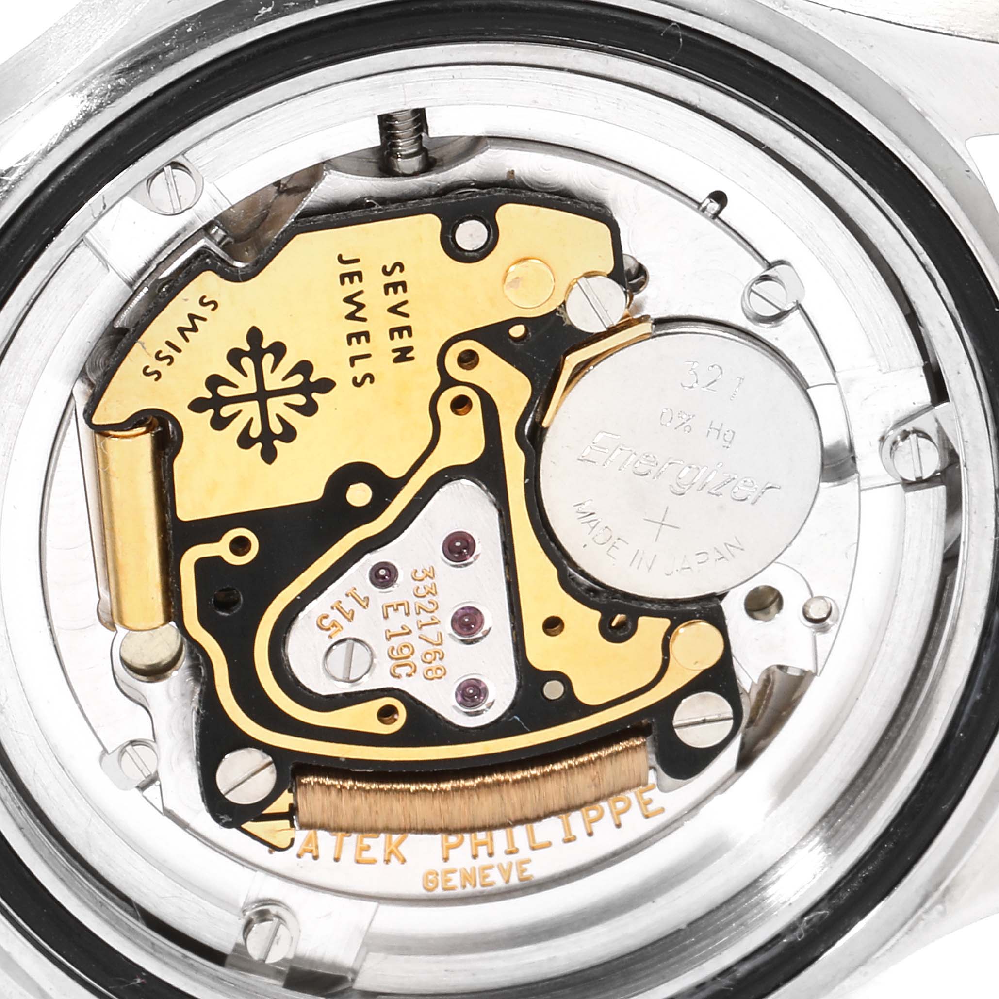 This image shows the intricate internal mechanism and movement of a Patek Philippe Aquanaut 4961 Women's Stainless Steel White Dial 4961 Women's Stainless Steel White Dial watch.