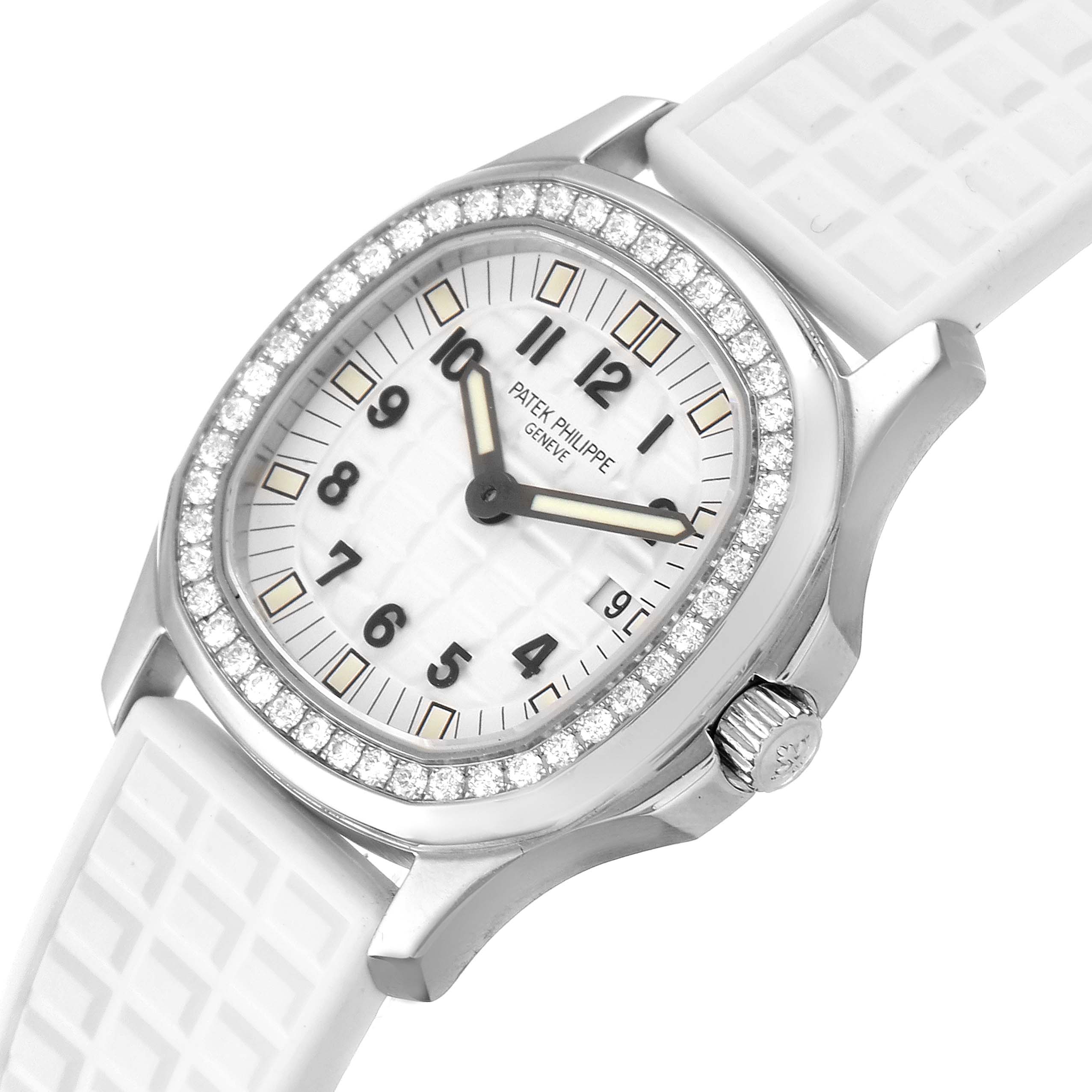The image shows a Patek Philippe Aquanaut 4961 Women's Stainless Steel White Dial 4961 Women's Stainless Steel White Dial watch at a slight angle, highlighting its face, bezel with diamonds, and white strap.