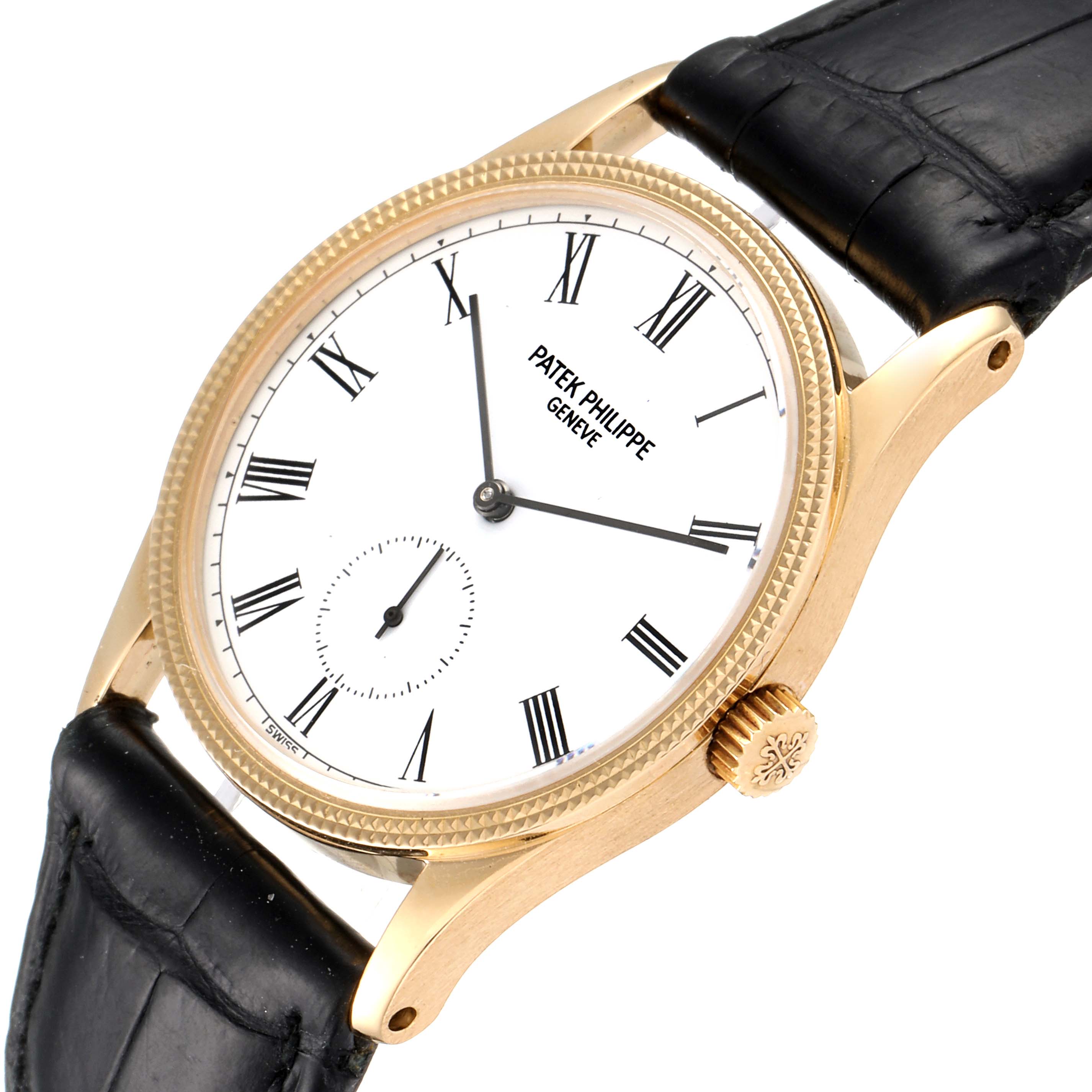 This image shows a Patek Philippe Vintage model watch angled from the upper left, highlighting the dial, crown, and black leather strap.