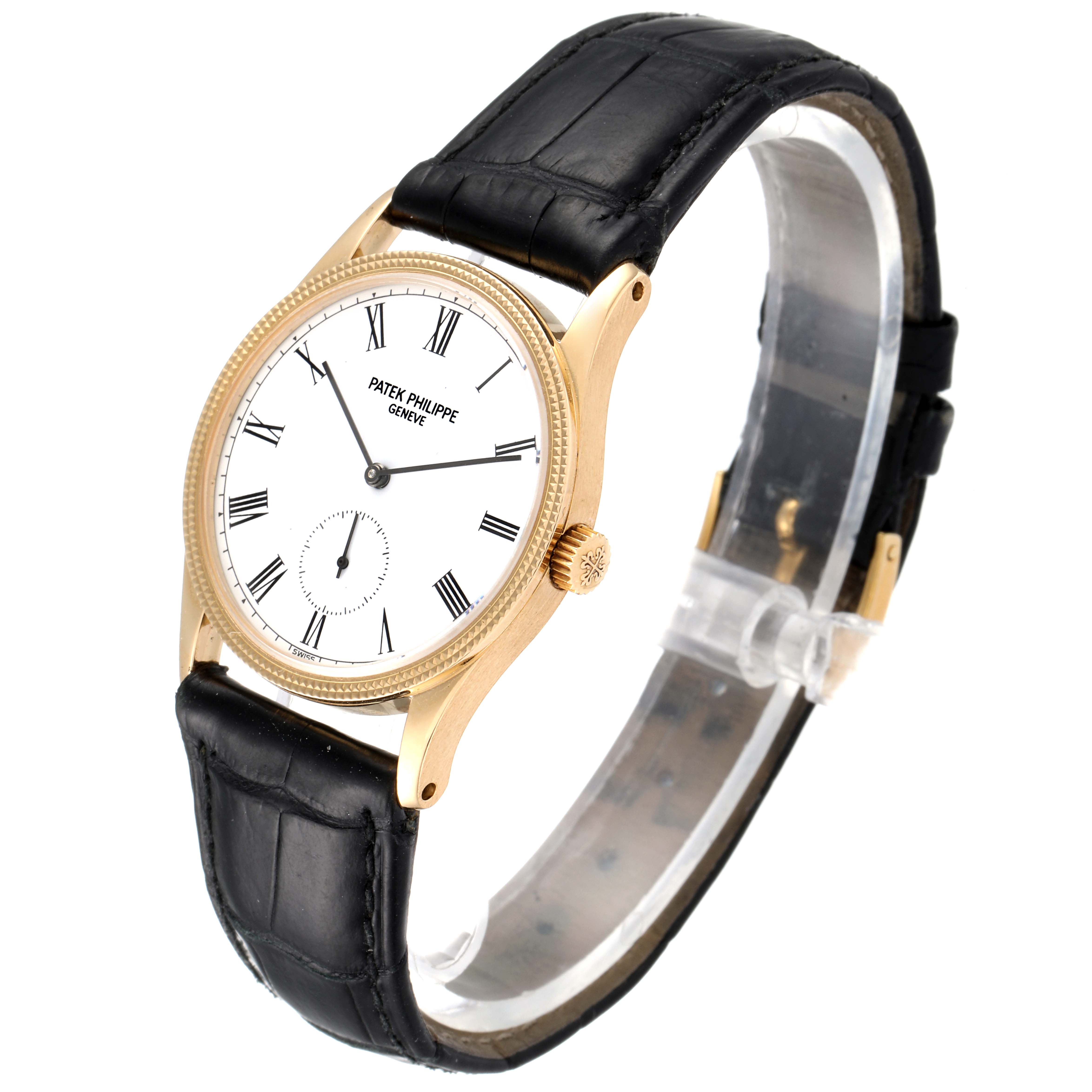 The image shows a Patek Philippe Vintage model watch from an angled view displaying the face, strap, and crown.