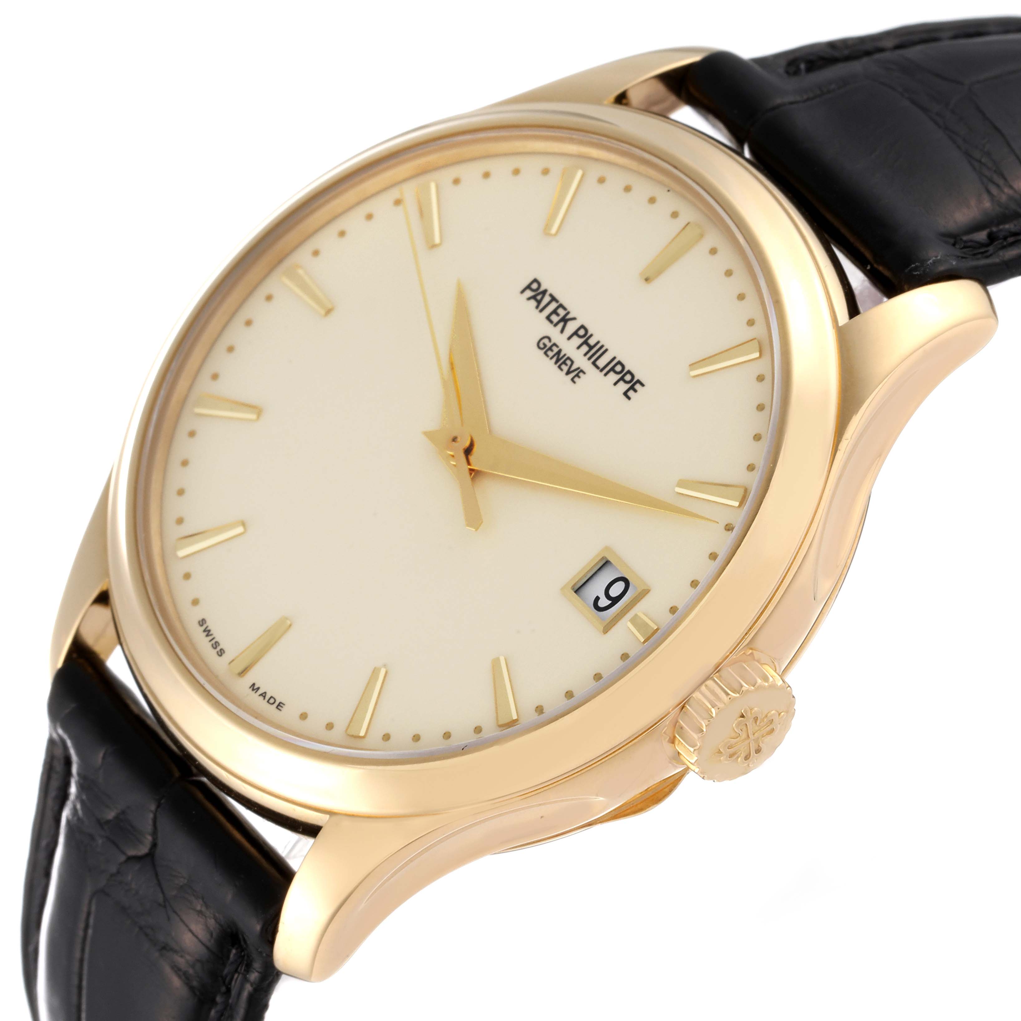 The image shows a side angle of a Patek Philippe Calatrava 5227J-001 Men's Yellow Gold Beige Dial 5227J-001 Men's Yellow Gold Beige Dial watch, highlighting the cream dial, gold case, crown, and black leather strap.