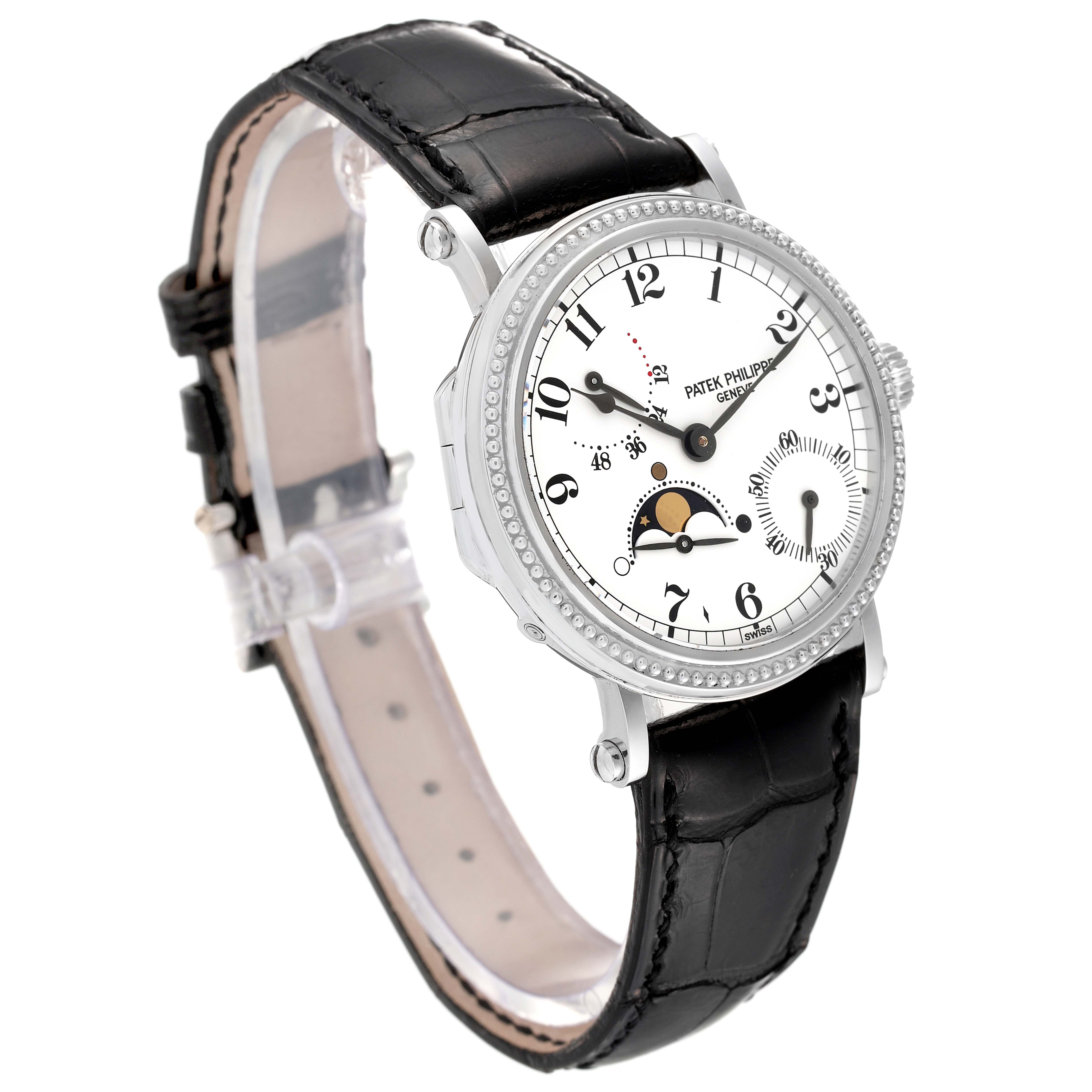 The image shows a Patek Philippe Complications 5015 Men's Platinum White Dial 5015 Men's Platinum White Dial watch at a slight left-side angle, displaying its white dial, complications, and black leather strap.