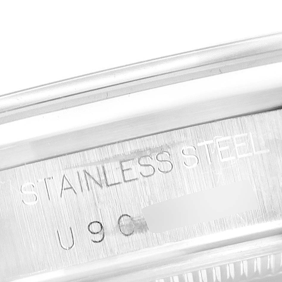 This image shows a close-up of the stainless steel case back of a Rolex Air-King 14000 Men's Stainless Steel Blue Dial 14000 Men's Stainless Steel Blue Dial watch.