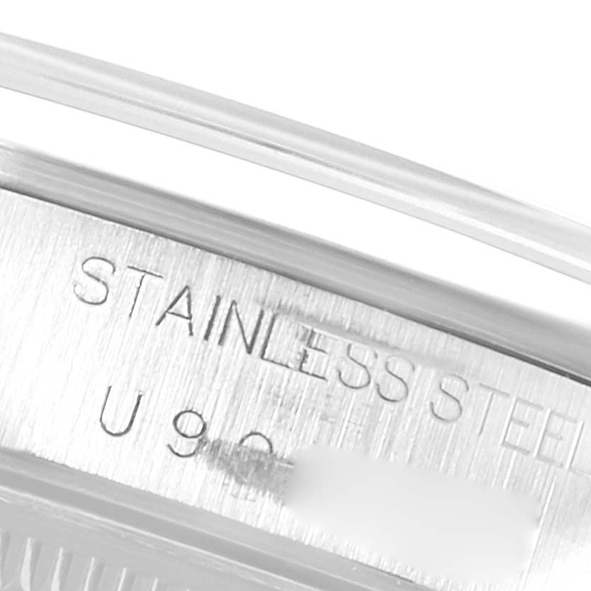 The image shows a close-up of the stainless steel marking on the case back edge of a Rolex Air-King 14000 Men's Stainless Steel Blue Dial 14000 Men's Stainless Steel Blue Dial watch.