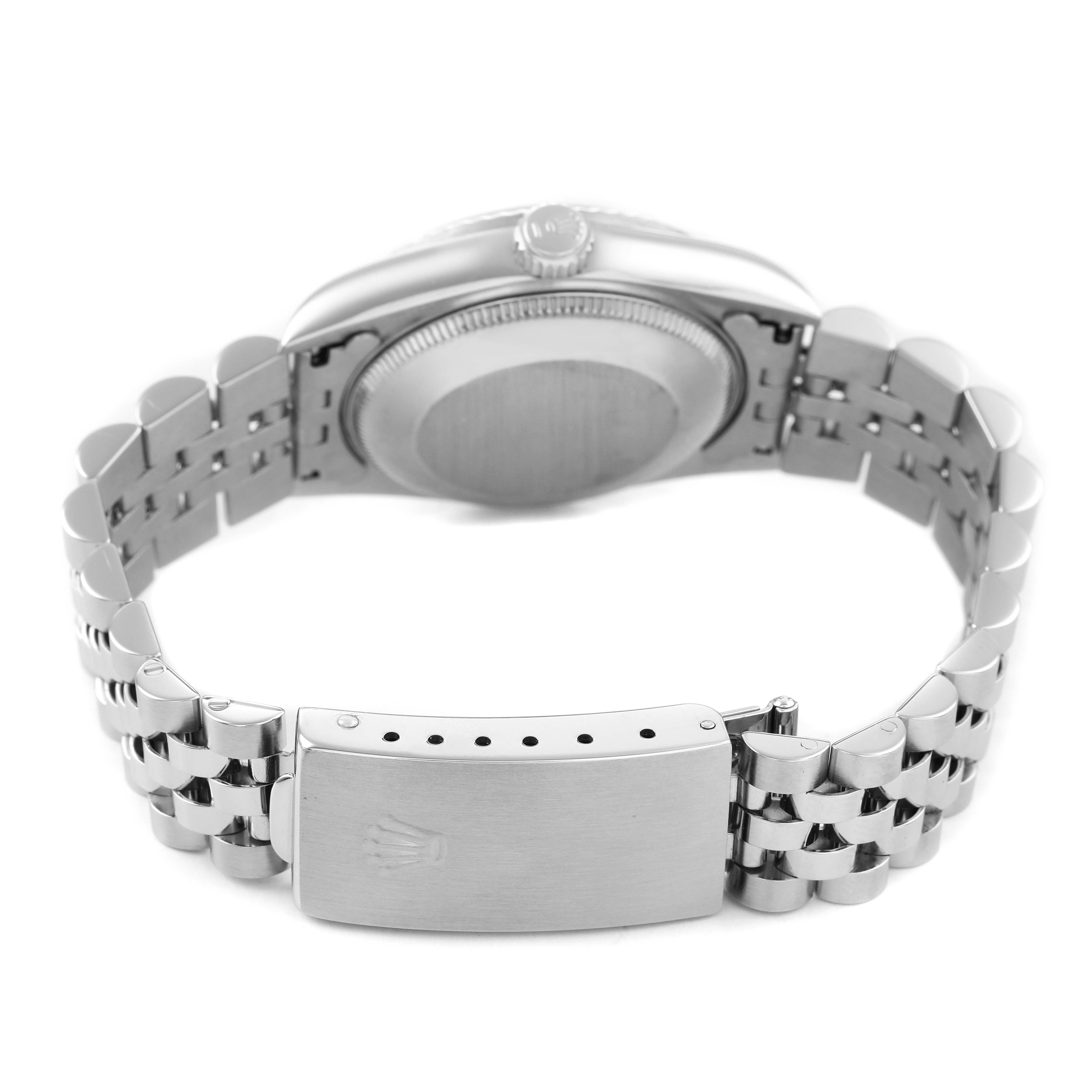 The image shows the back view of a Rolex Mid-Size 68274 Women's Stainless Steel Black Dial watch, highlighting the case back, crown, and Jubilee bracelet with a visible clasp.