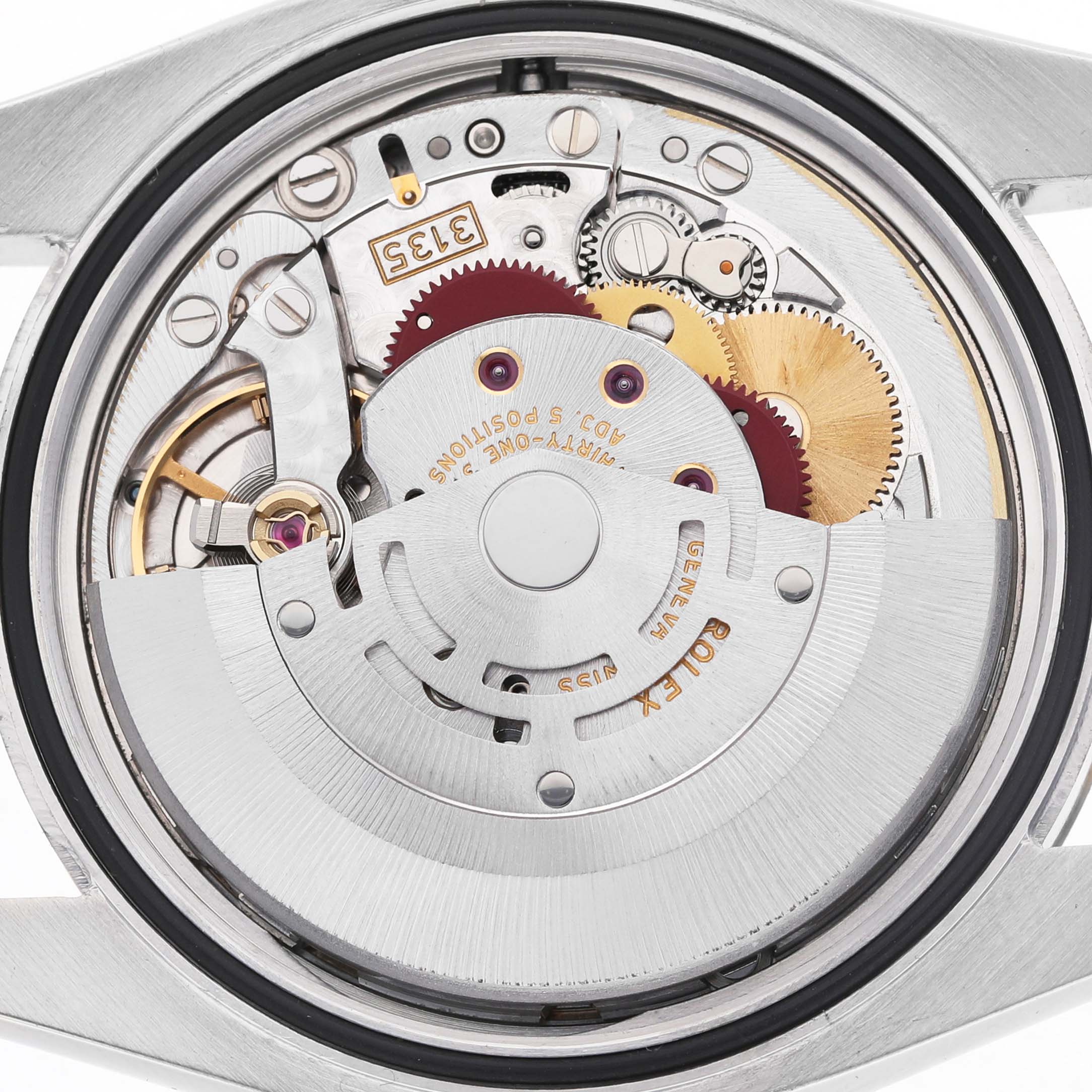 The image shows the movement mechanism of a Rolex Datejust 116233 Men's Stainless Steel Champagne Dial watch from a top-down angle, highlighting gears and rotors.