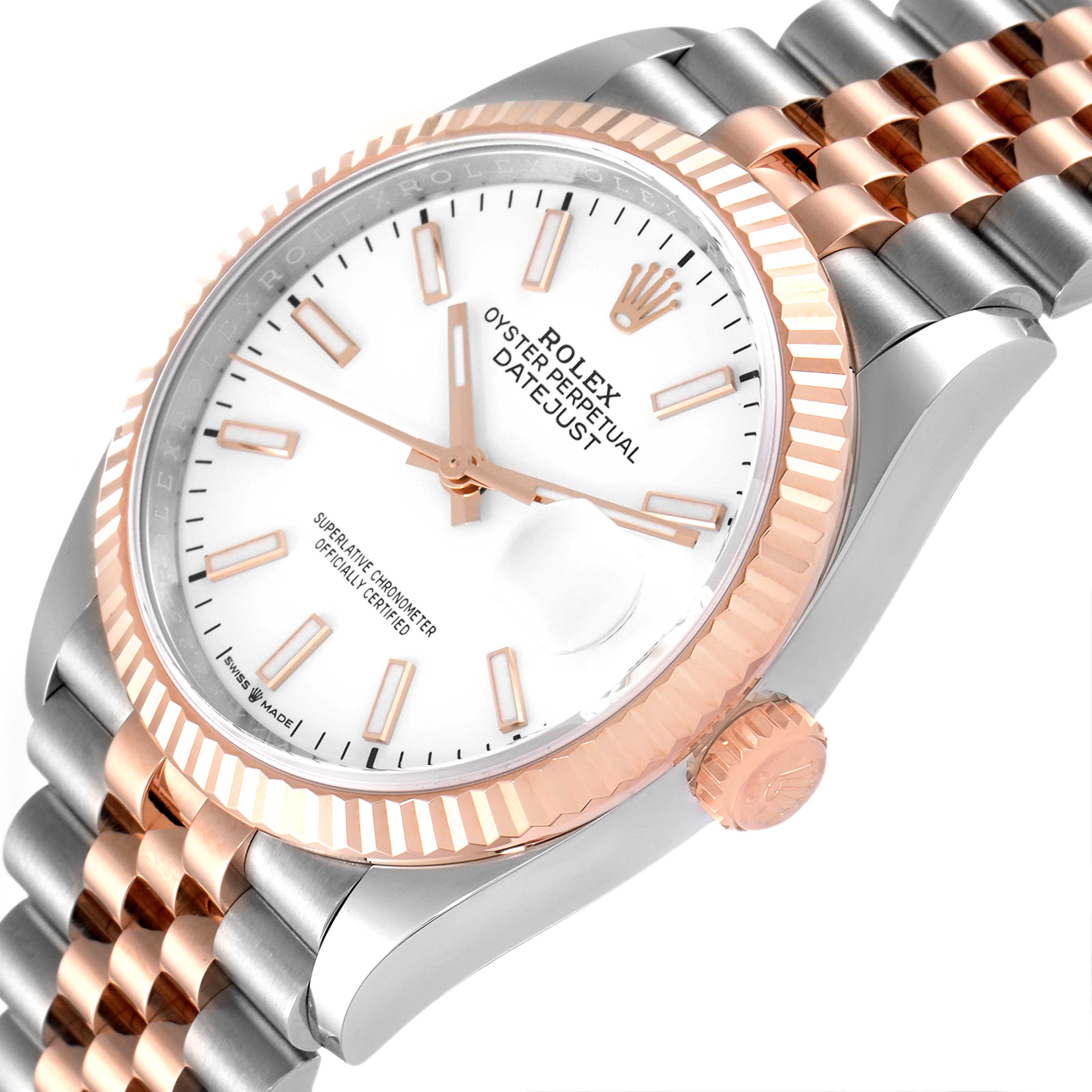 The image shows a close-up angle of the Rolex Datejust 126231 Men's Steel and Gold (two tone) White Dial 126231 Men's Steel and Gold (two tone) White Dial watch, focusing on the face, bezel, and a portion of the bracelet.
