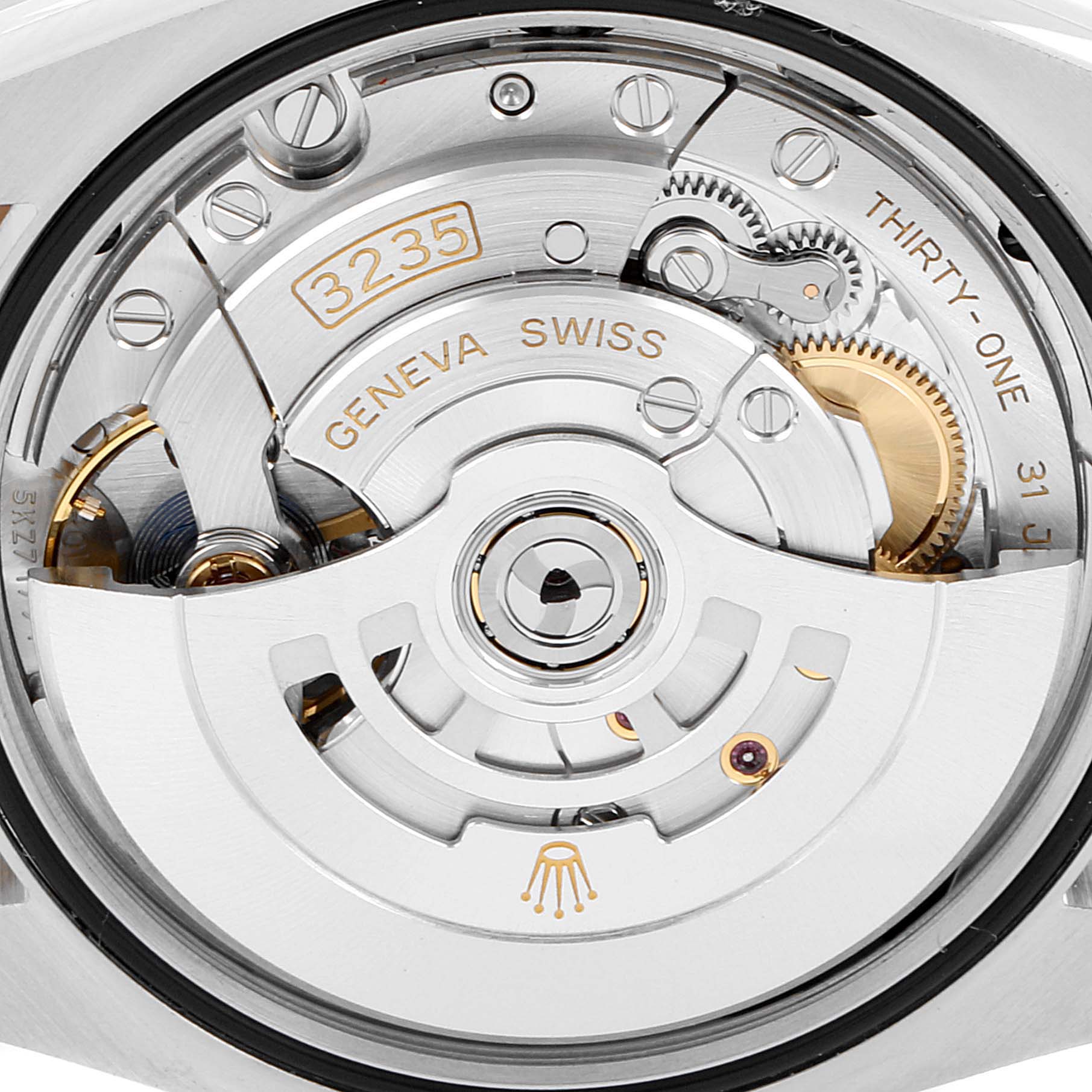 The image shows a close-up of the movement mechanism of a Rolex Datejust 126231 Men's Steel and Gold (two tone) White Dial 126231 Men's Steel and Gold (two tone) White Dial watch.