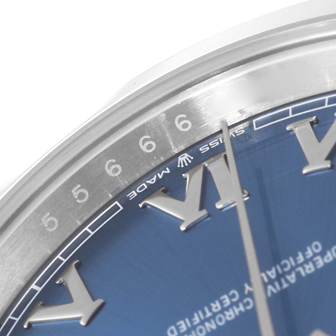 This close-up angle shows the dial and part of the bezel of the Rolex Datejust 41 126300 Men
s Stainless Steel Blue Dial 126300 Men
s Stainless Steel Blue Dial, highlighting the Roman numerals and minute markers.