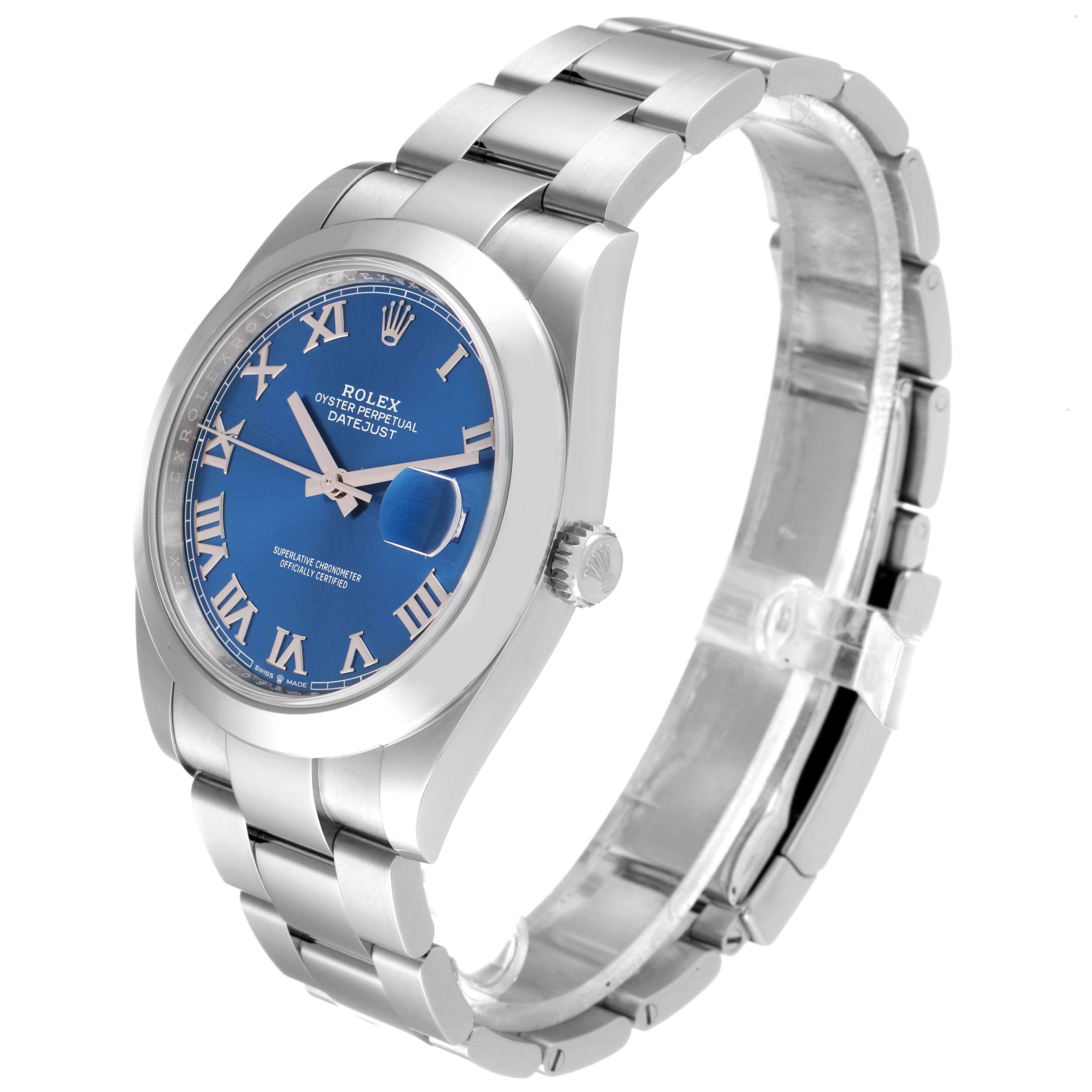 The Rolex Datejust 41 126300 Men
s Stainless Steel Blue Dial 126300 Men
s Stainless Steel Blue Dial is shown at an oblique angle, displaying its blue dial, roman numerals, stainless steel case, and bracelet.