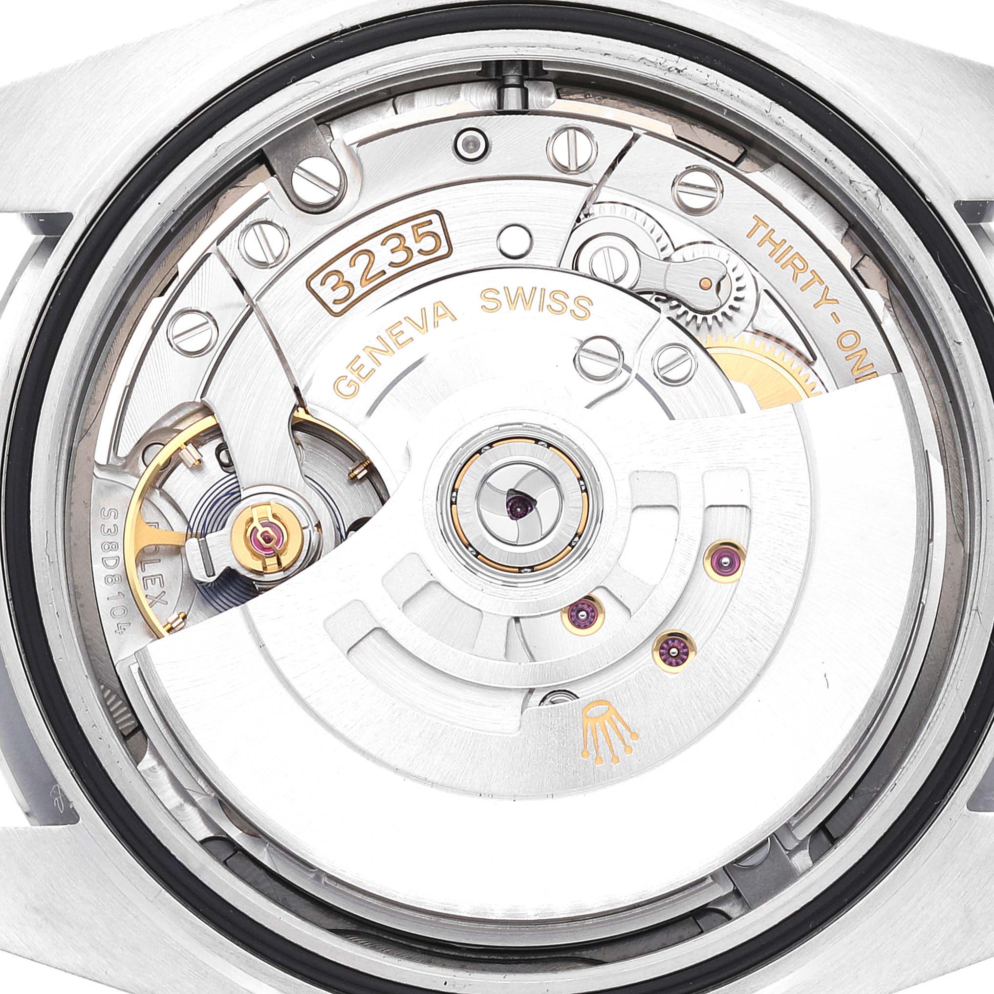 The image shows the rear view of the movement mechanism of a Rolex Datejust 41 126300 Men's Stainless Steel Grey Dial 126300 Men's Stainless Steel Grey Dial watch, focusing on the intricate internal components.