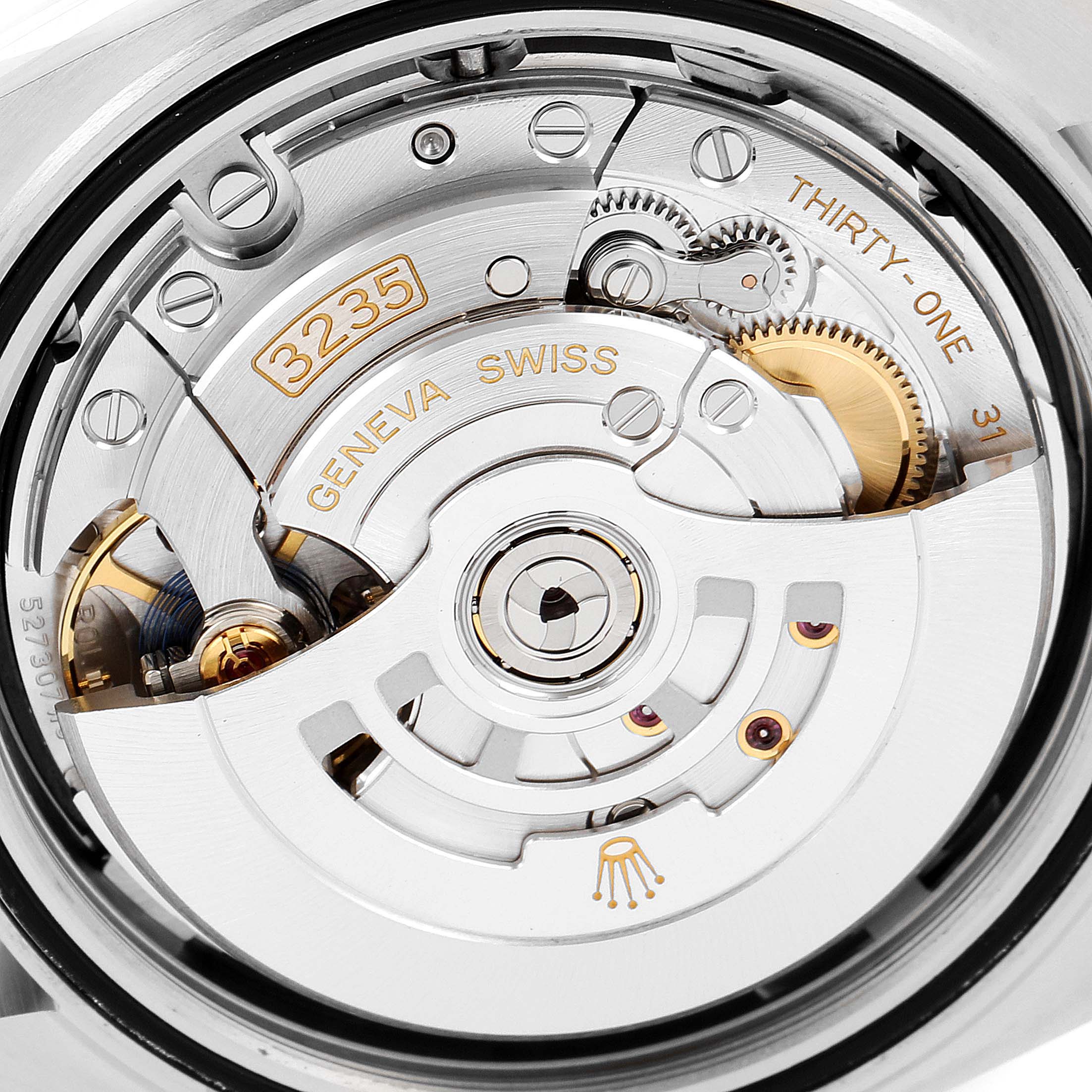 This image shows the movement mechanism of a Rolex Datejust 41 126334 Men's Stainless Steel Black Dial 126334 Men's Stainless Steel Black Dial, focusing on its intricate internal components.