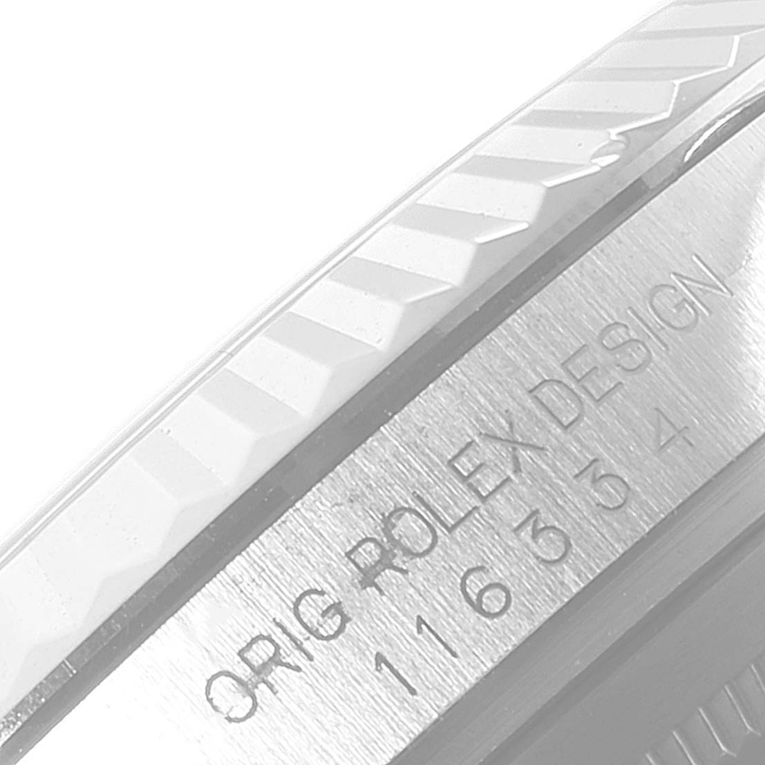 This image shows a close-up of the bezel and part of the case side of a Rolex Datejust 41 116334 Men's Stainless Steel White Dial 116334 Men's Stainless Steel White Dial watch.