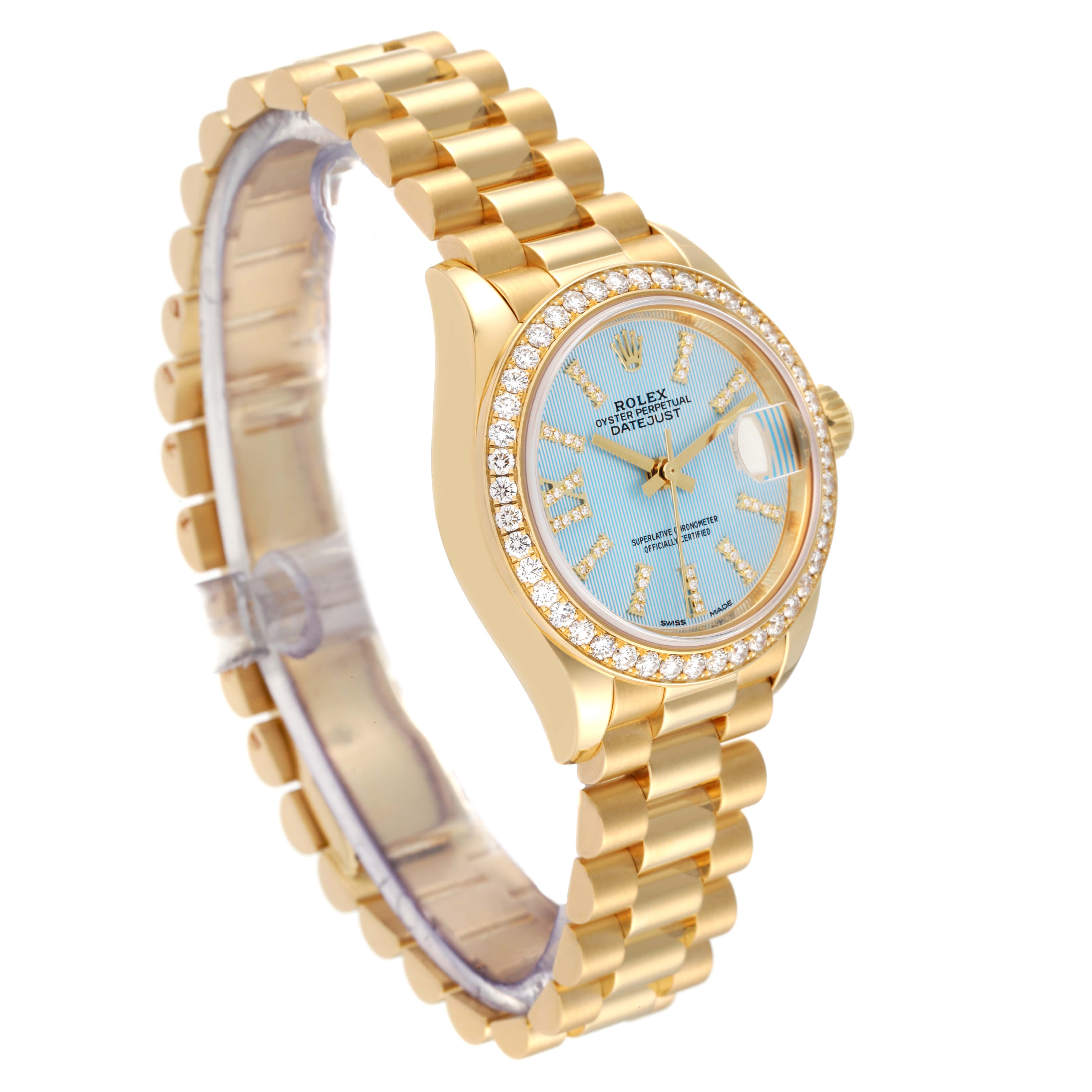The image shows a Rolex President 279138 Women's Yellow Gold Blue Dial 279138 Women's Yellow Gold Blue Dial model watch at a three-quarter angle, featuring its gold bracelet and diamond-encrusted bezel.