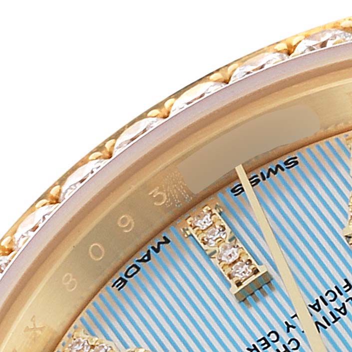 The image shows a close-up angle of the dial and bezel of a Rolex President 279138 Women's Yellow Gold Blue Dial 279138 Women's Yellow Gold Blue Dial model watch, highlighting diamond indices and a striped pattern.
