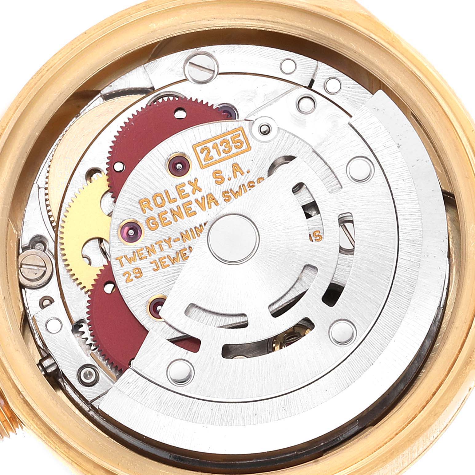 This is an image of the movement and internal components of a Rolex President 69178 Women
s Yellow Gold Champagne Dial 69178 Women
s Yellow Gold Champagne Dial model watch, showing gears and other mechanisms.