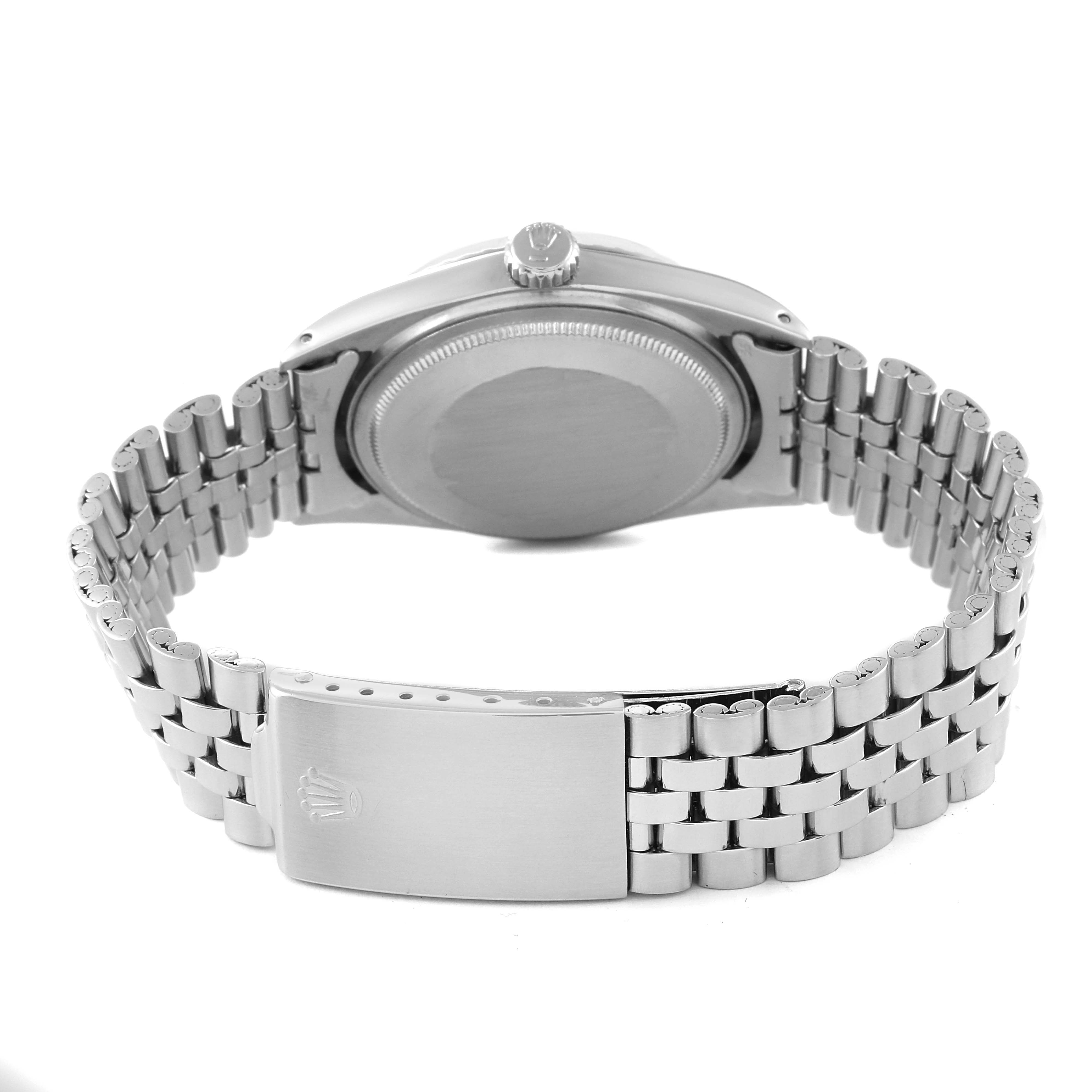 This image shows the back view of a Rolex Datejust 1603 Men's Stainless Steel Silver Dial 1603 Men's Stainless Steel Silver Dial watch, highlighting the case back, crown, and bracelet clasp.