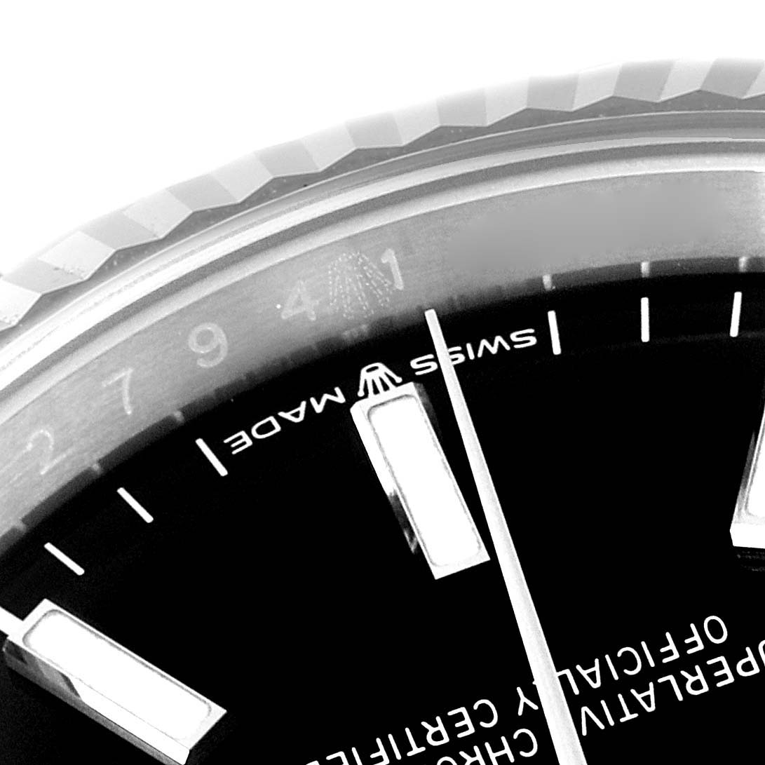 The image shows a close-up angle of the dial and bezel of a Rolex Datejust 126234 Men
s Stainless Steel Black Dial 126234 Men
s Stainless Steel Black Dial watch, highlighting the "SWISS MADE" label.
