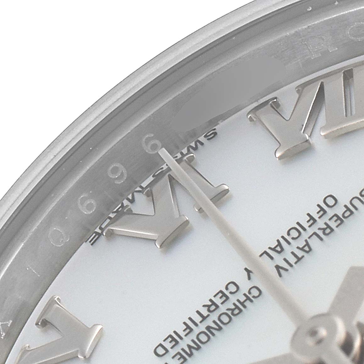 The image shows a close-up of the dial of a Rolex Datejust 179174 Women's Stainless Steel Mother of Pearl Dial 179174 Women's Stainless Steel Mother of Pearl Dial, focusing on the VI and sweep seconds hand.